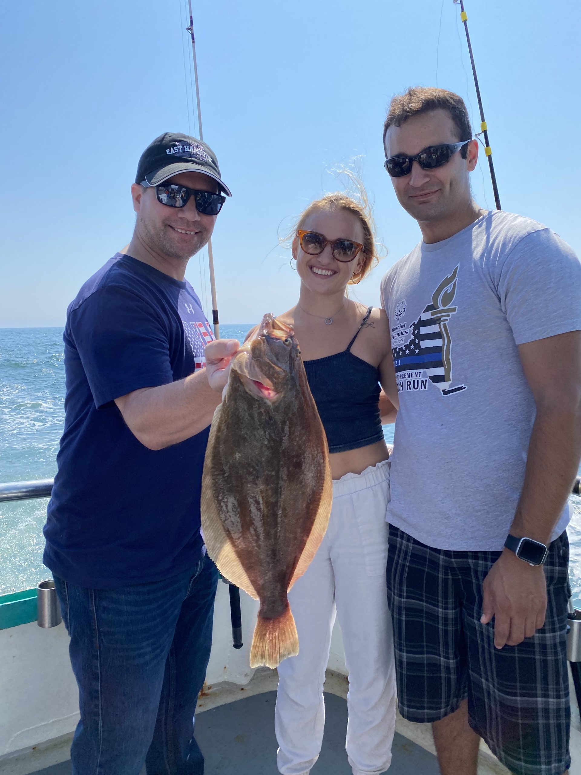 a person holding a fish