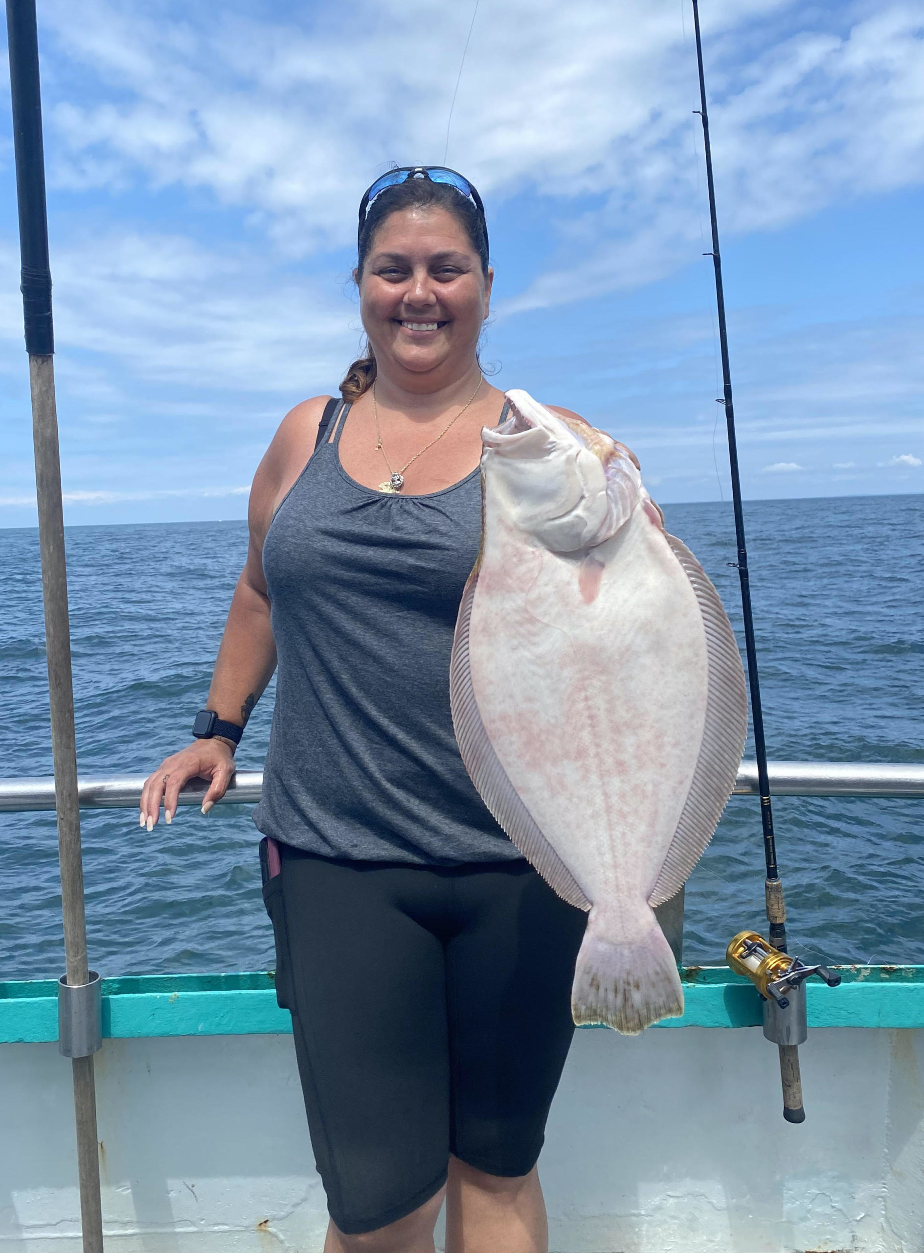 a person standing in front of a body of water