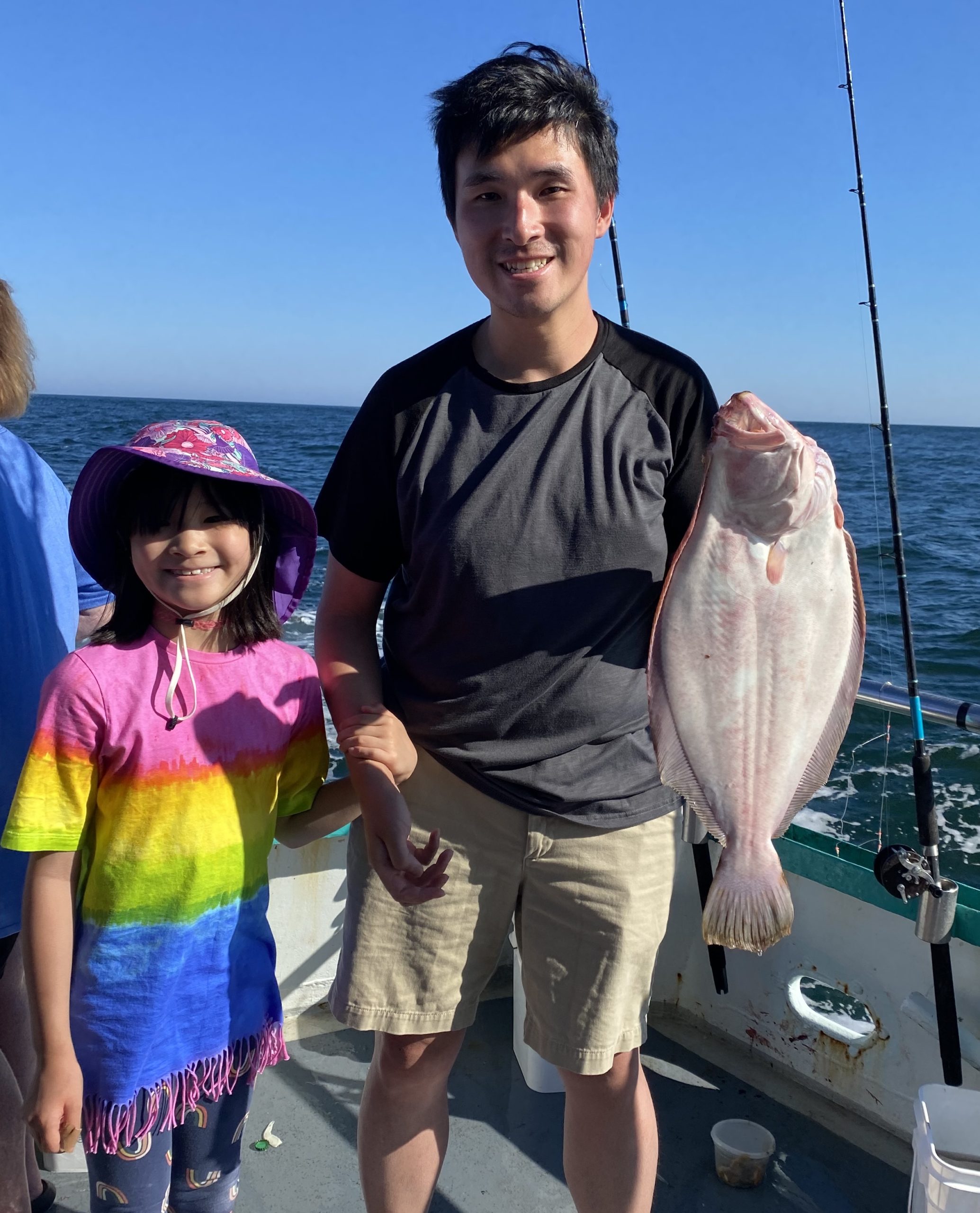 a man holding a fish