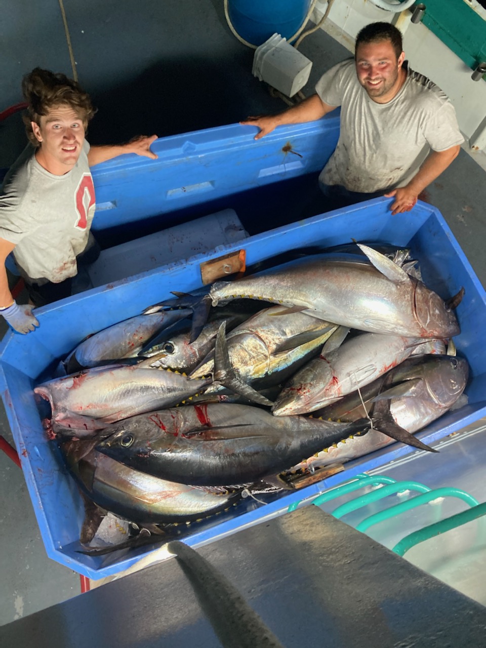 a man holding a fish