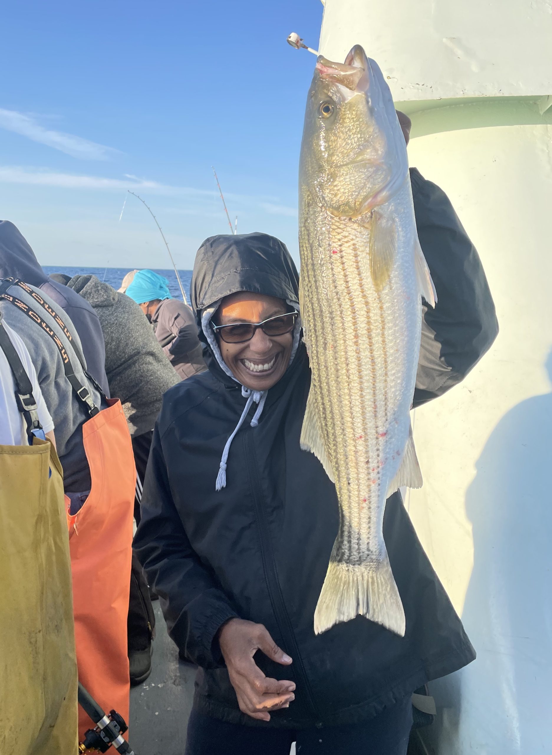 a person holding a fish