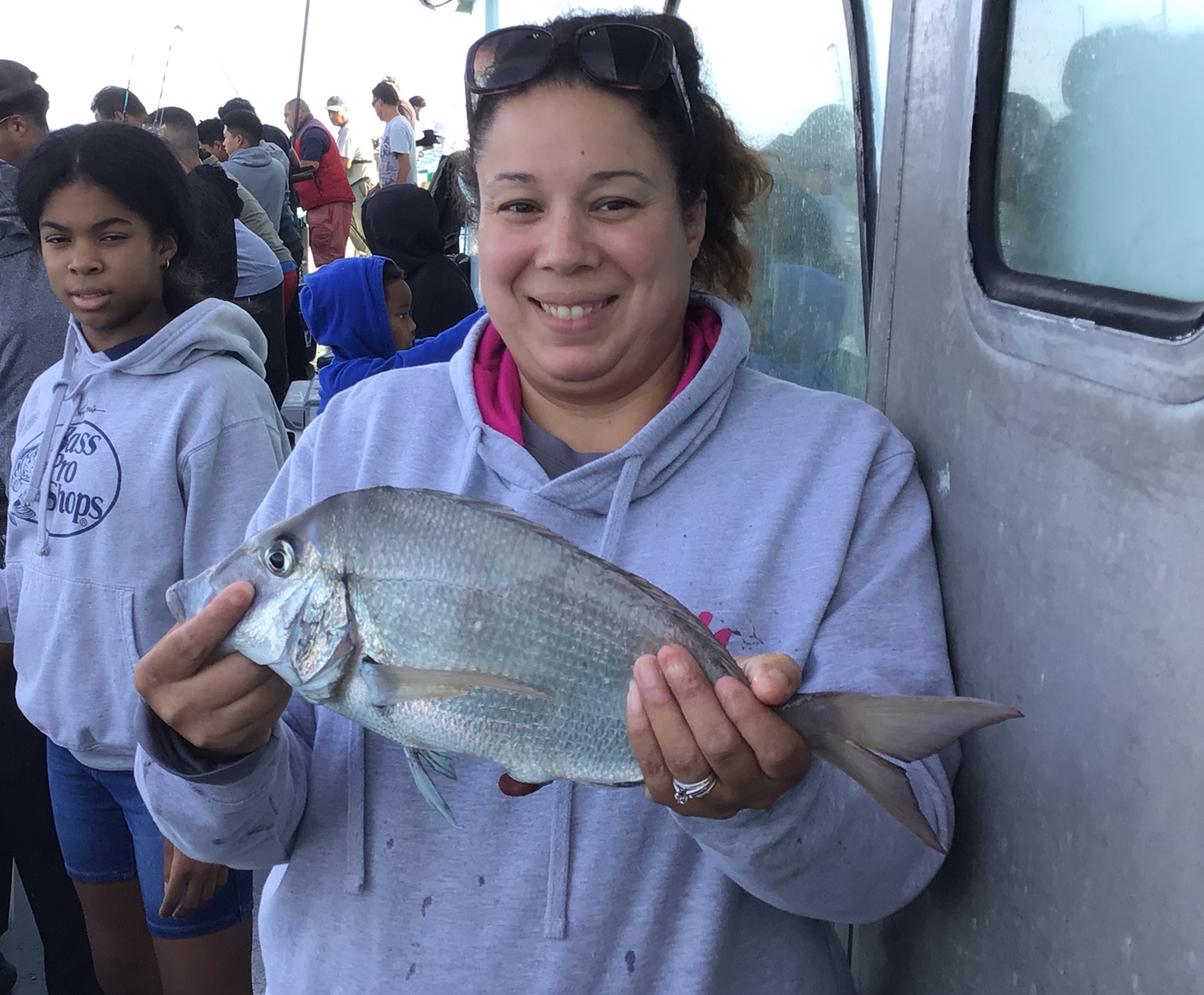 a person holding a fish