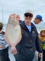 a person holding a fish