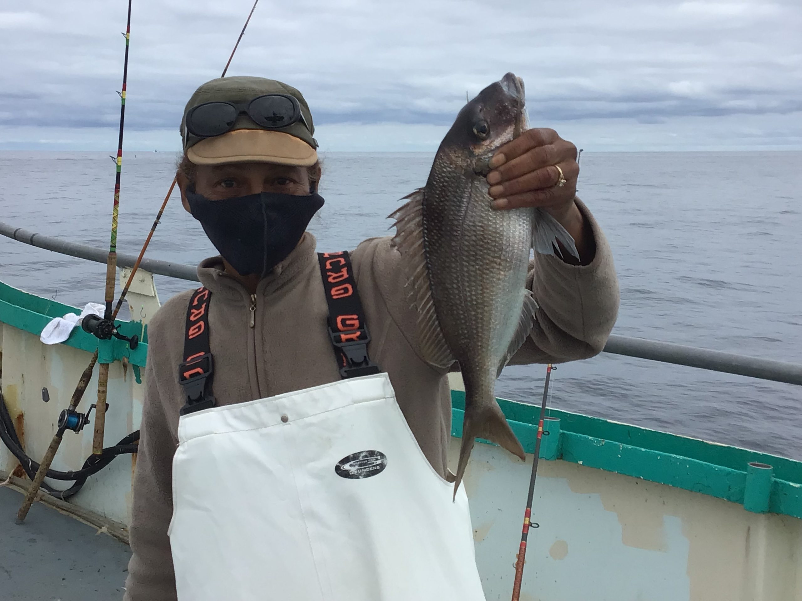 a couple of people that are standing in the snow