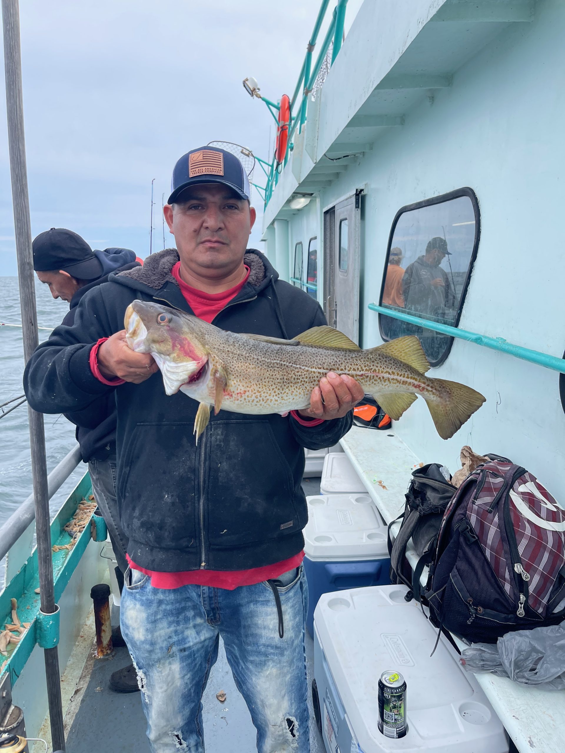a person holding a fish
