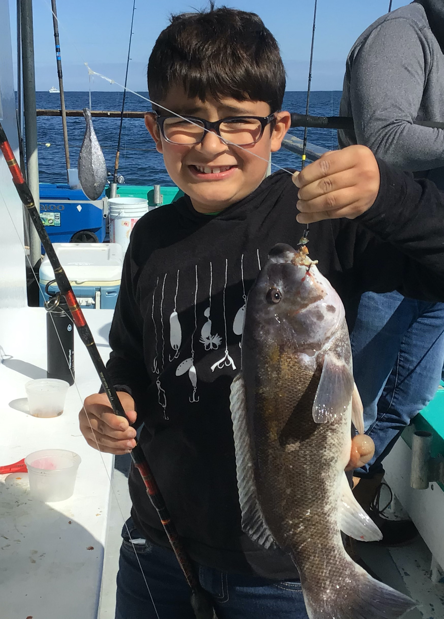 a person holding a fish