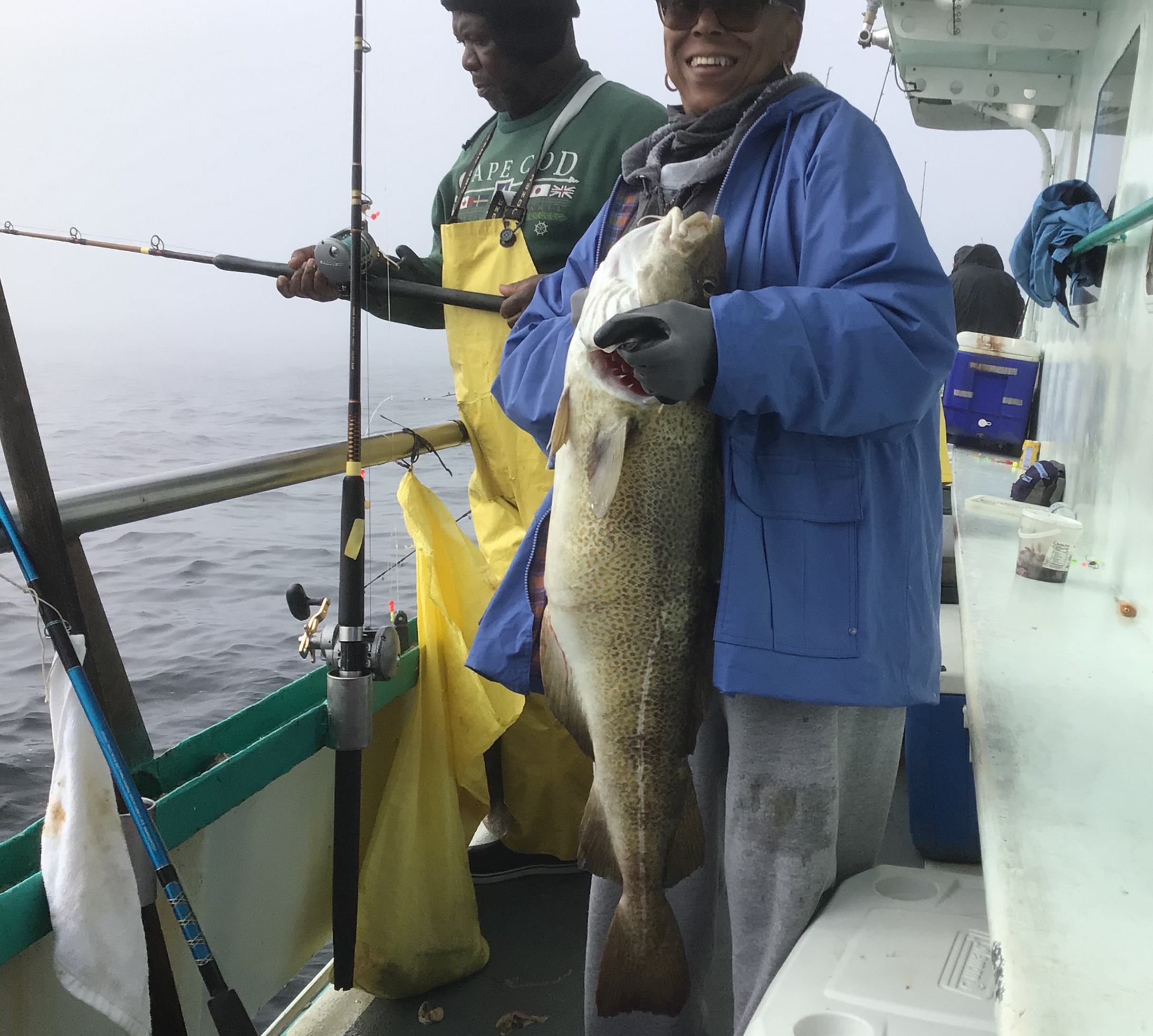 a person holding a fish