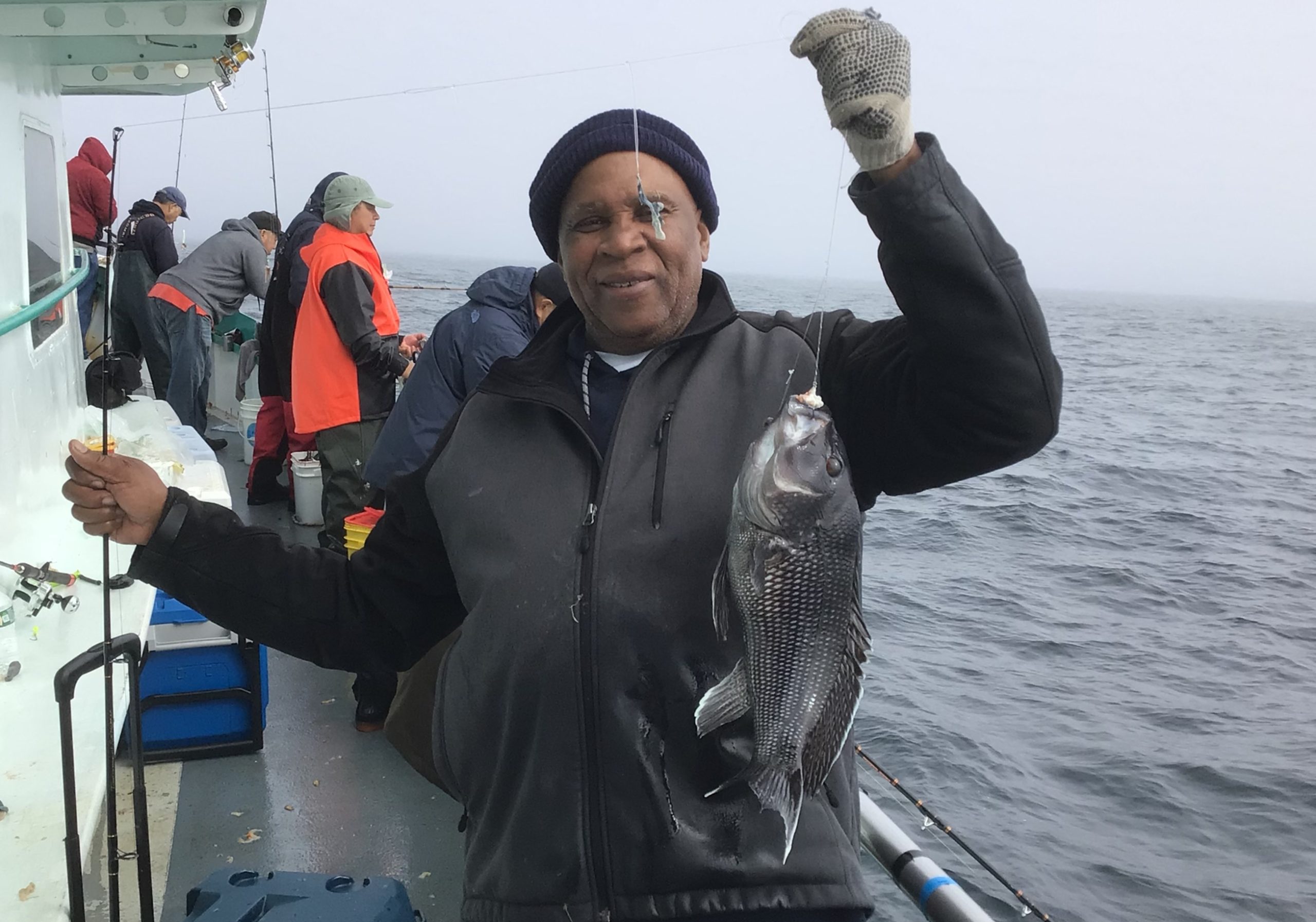 a person holding a fish