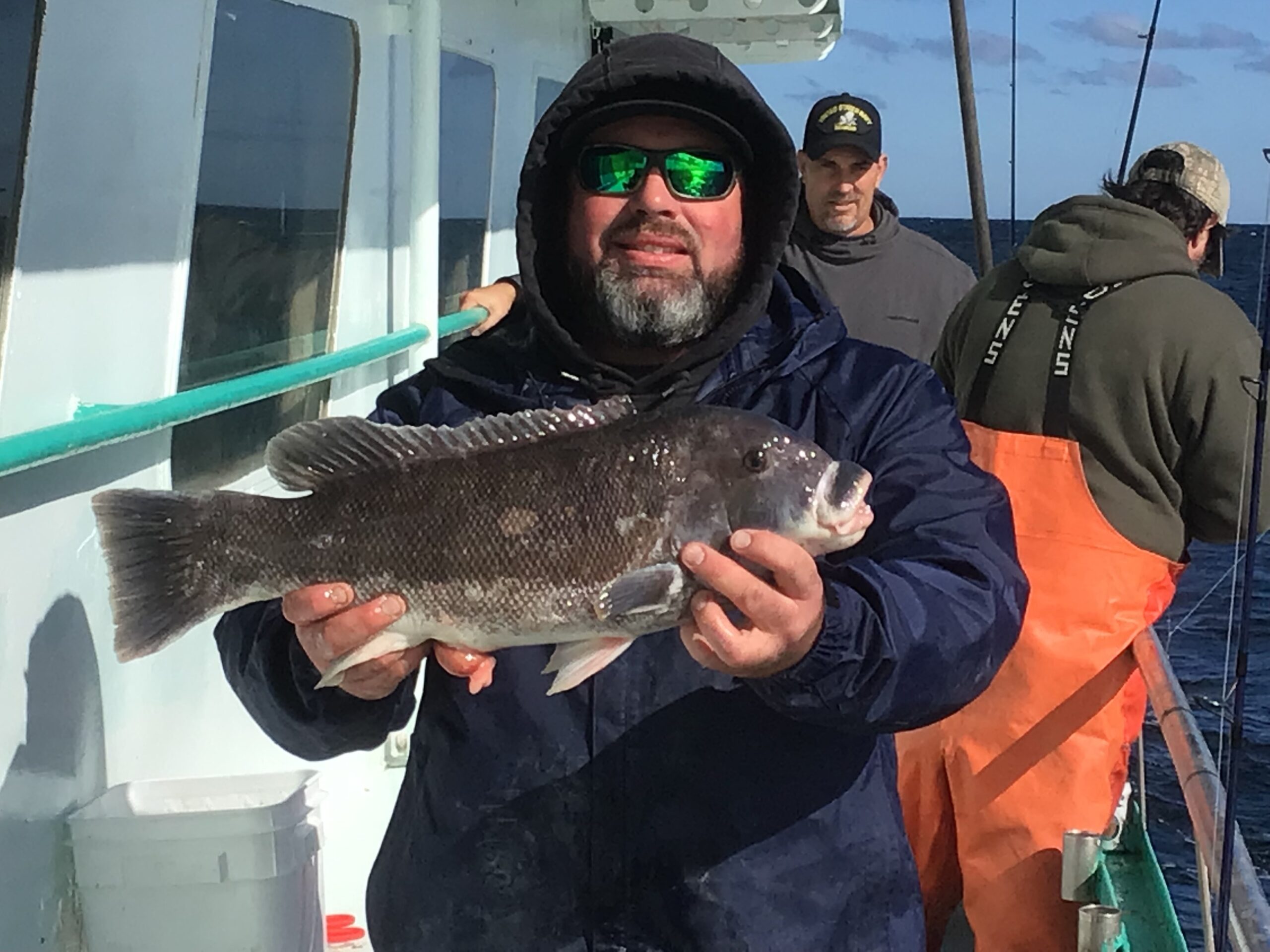 a person holding a fish