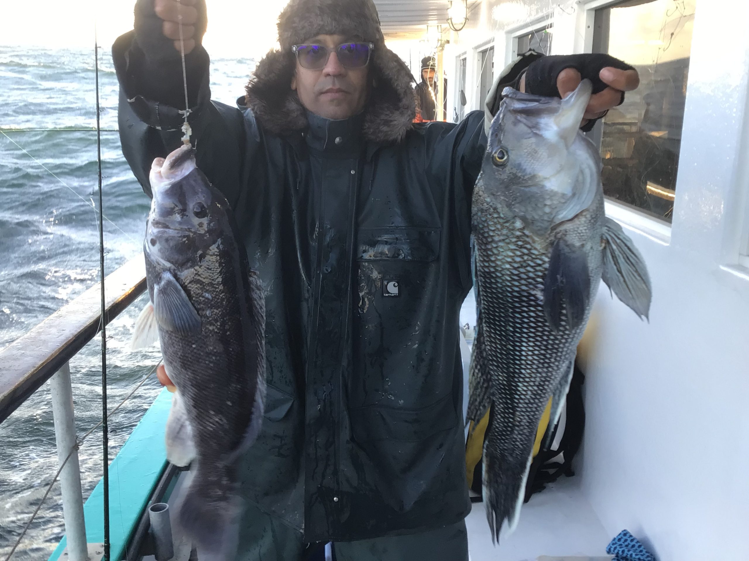 a person holding a fish