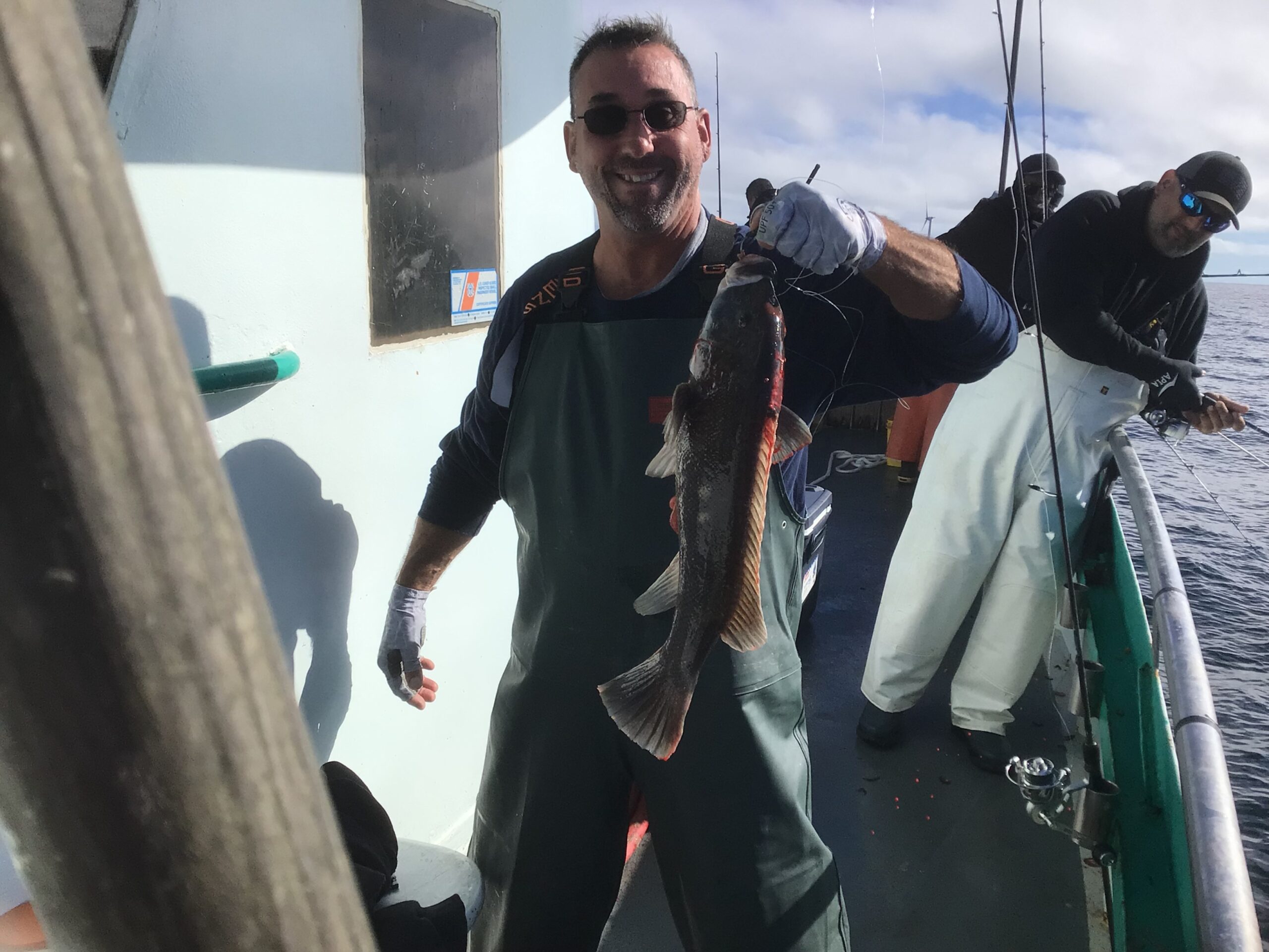 a couple of people that are standing in the snow