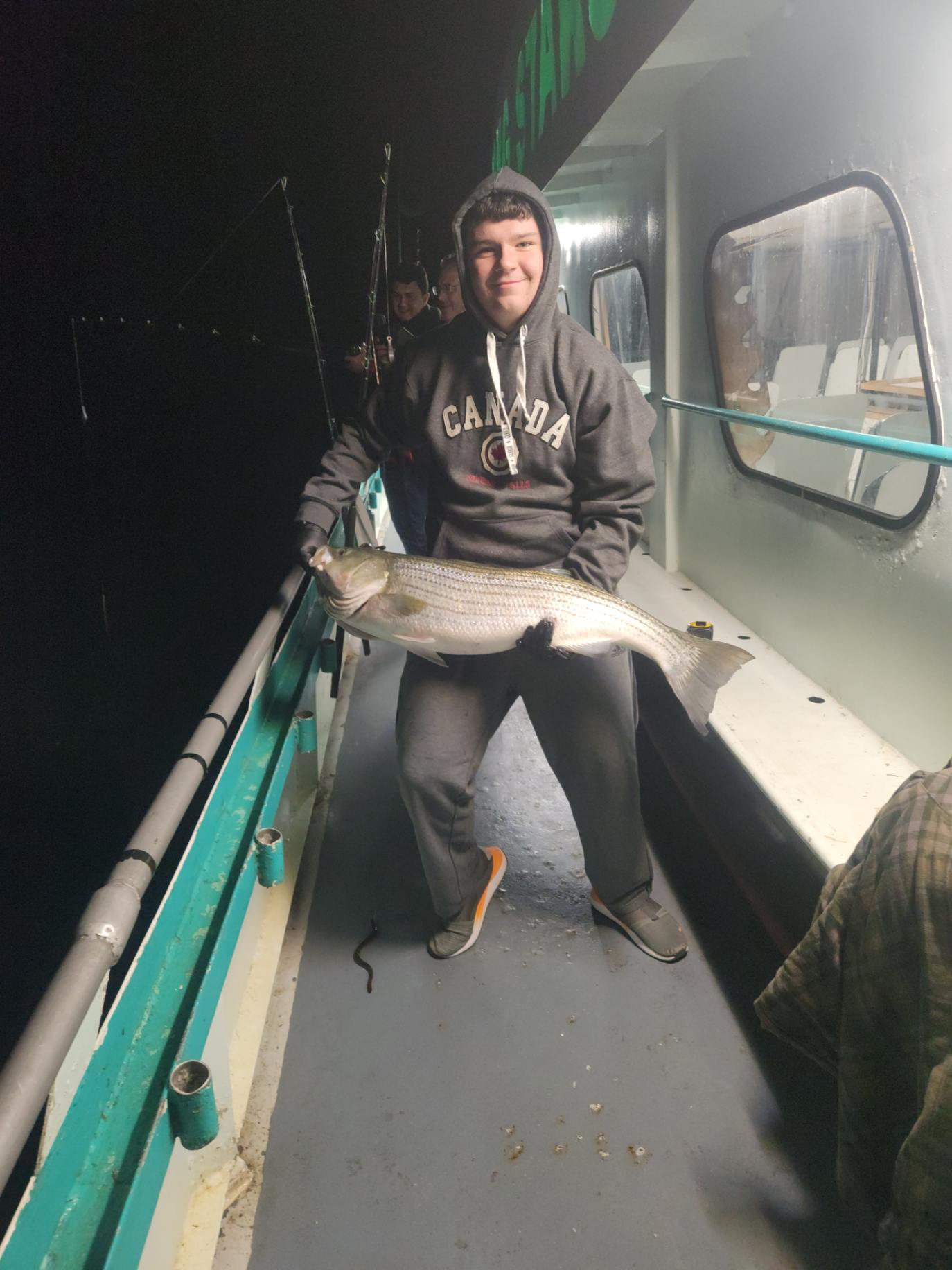 a man sitting on a boat
