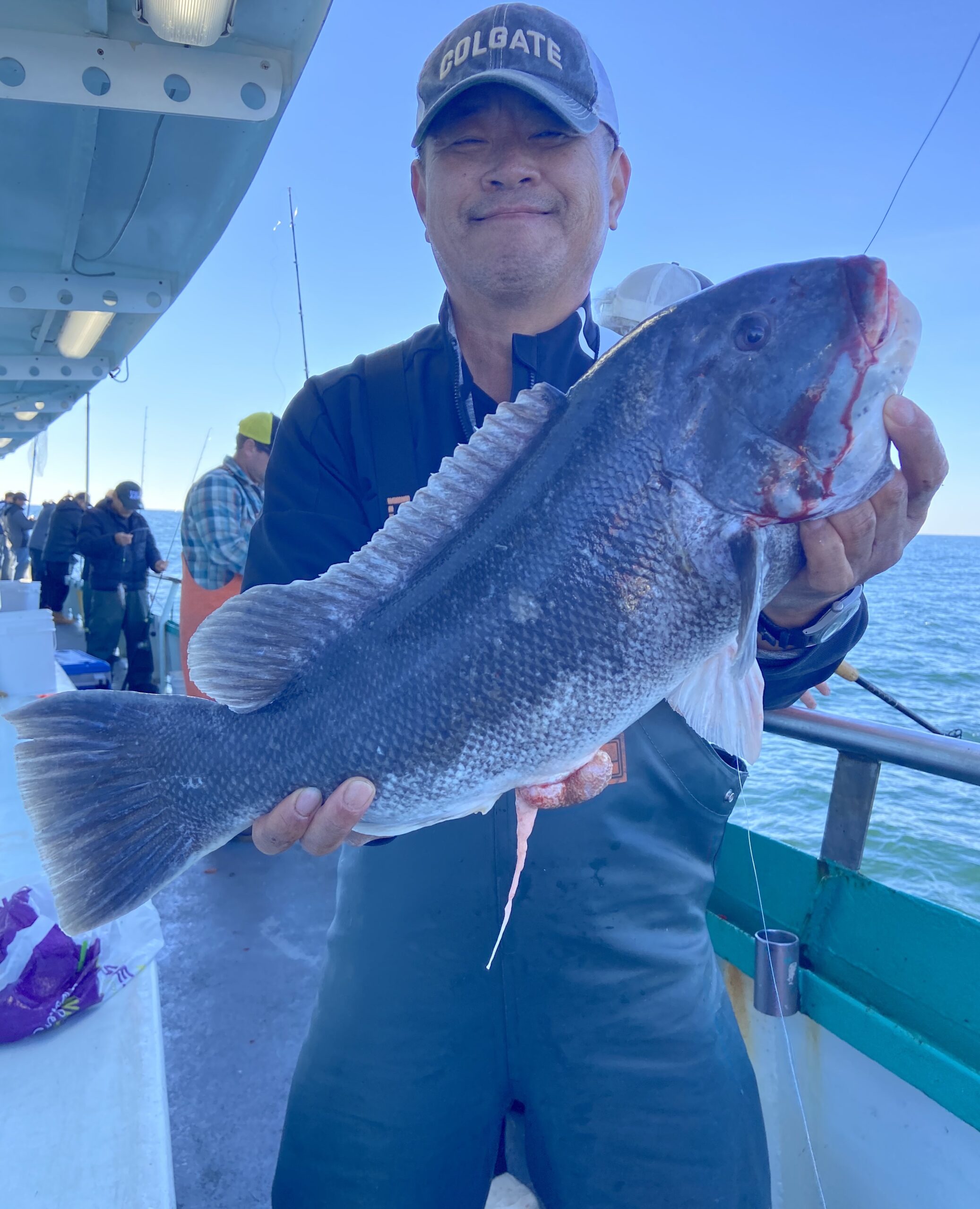 a person holding a fish