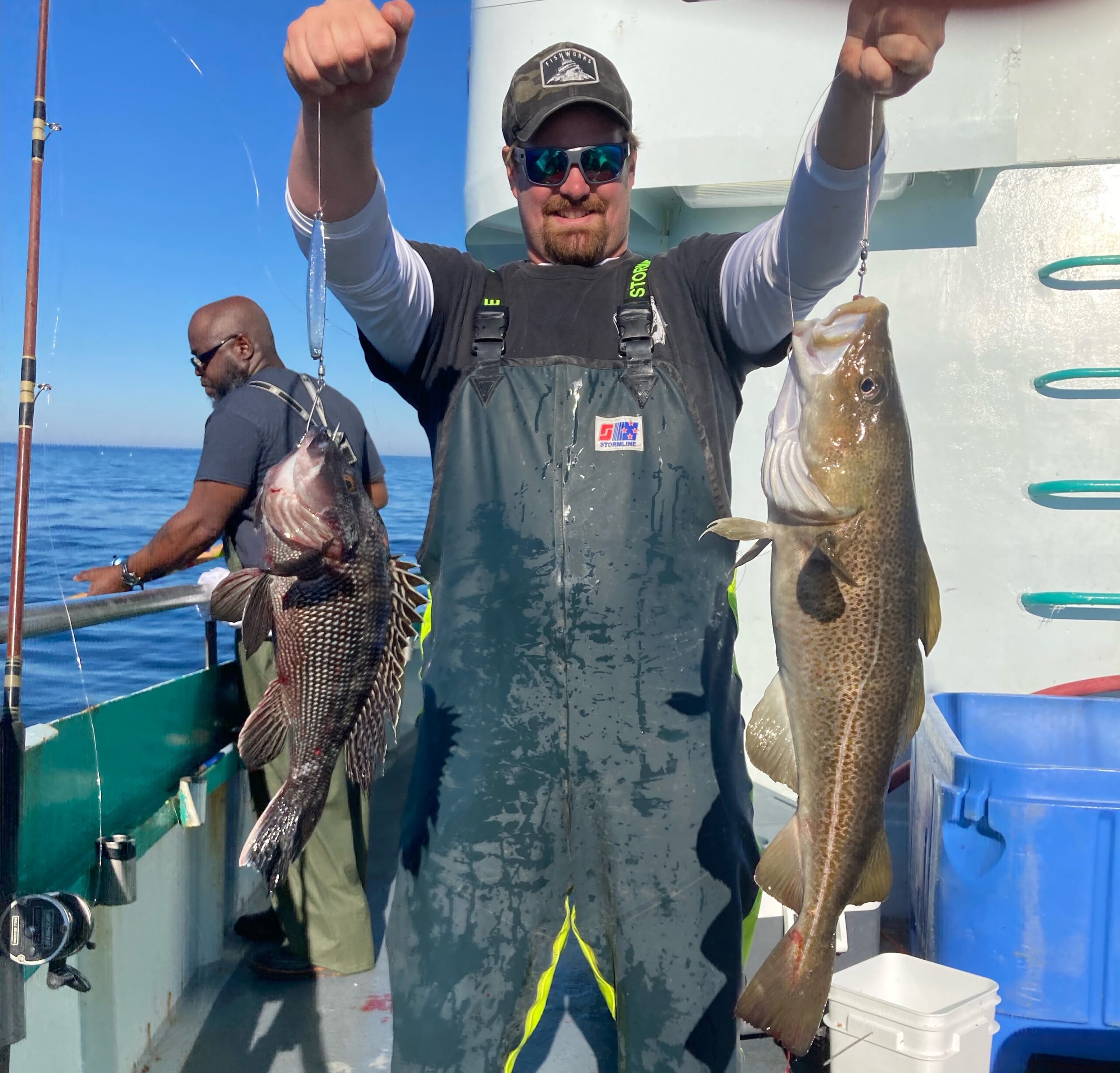 a person holding a fish