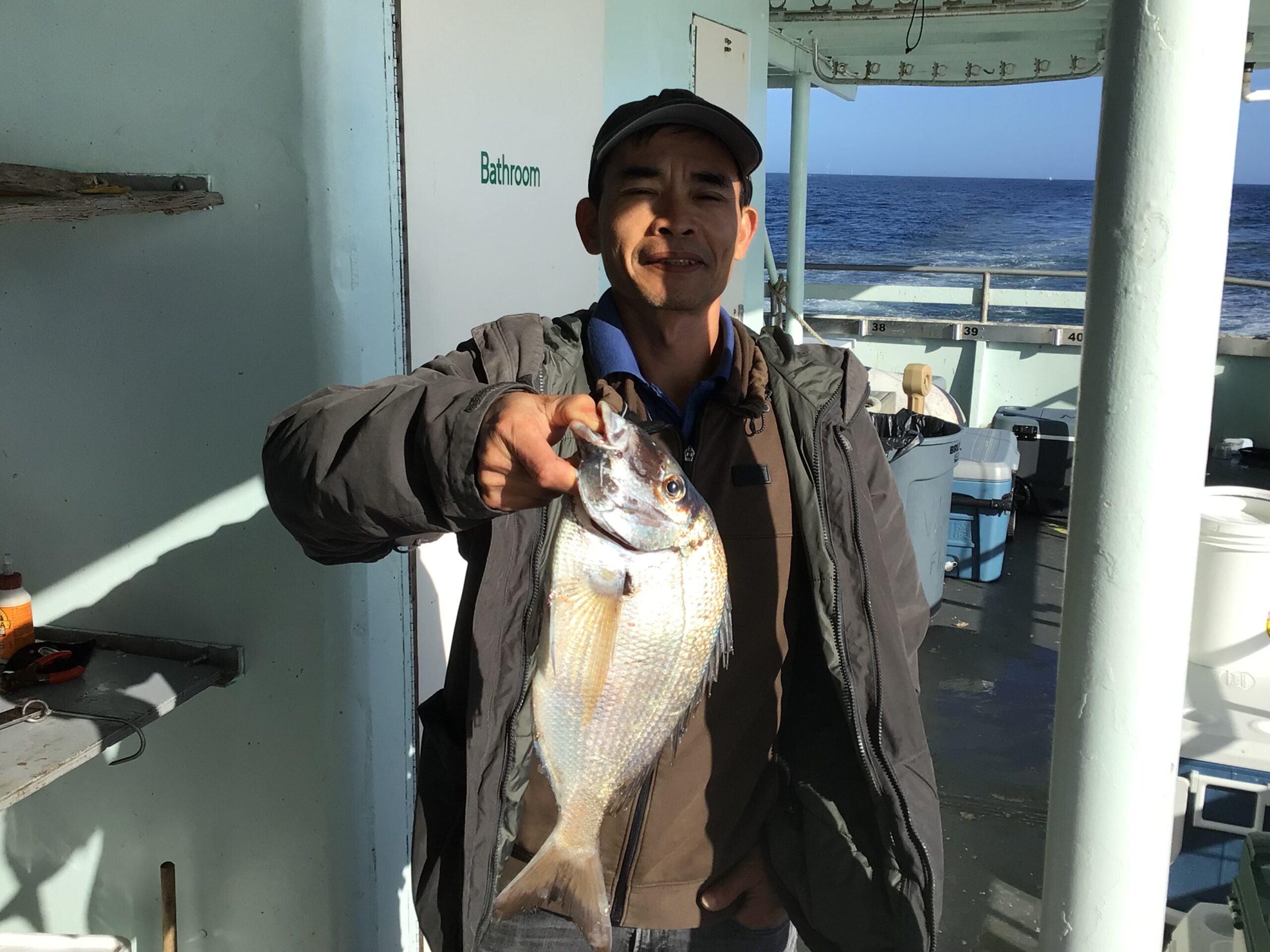 a person holding a fish