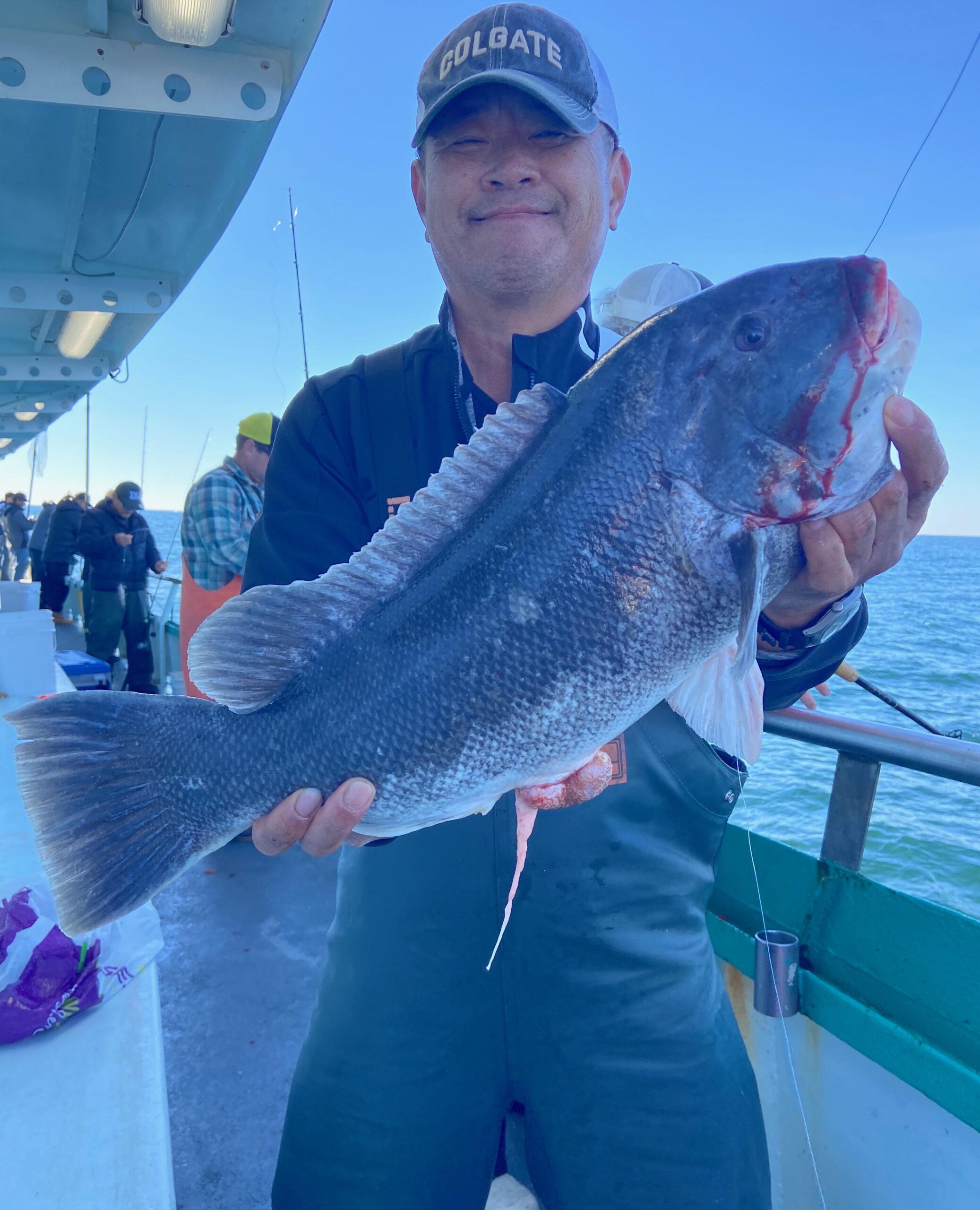 a person holding a fish