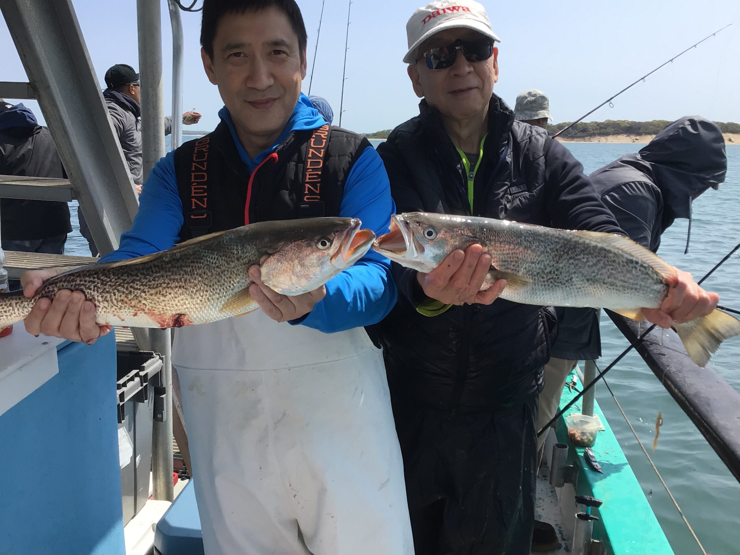 a person holding a fish