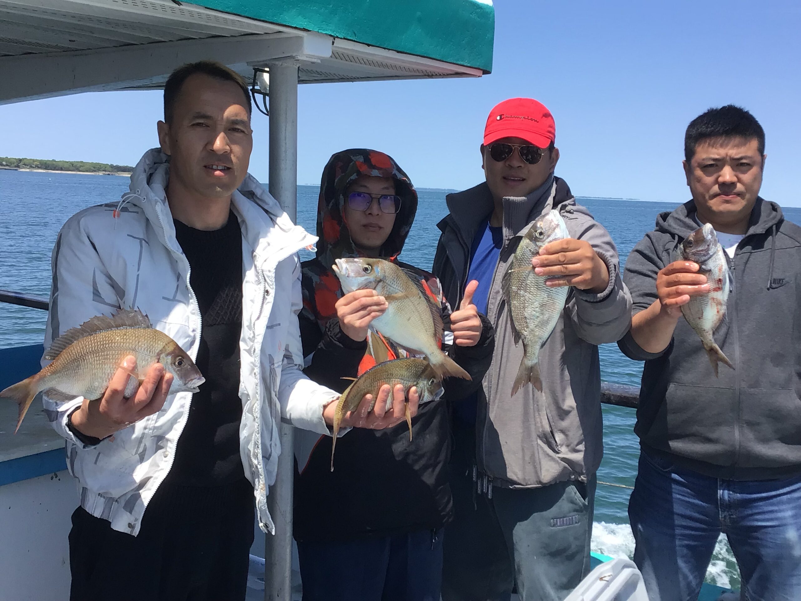a person holding a fish