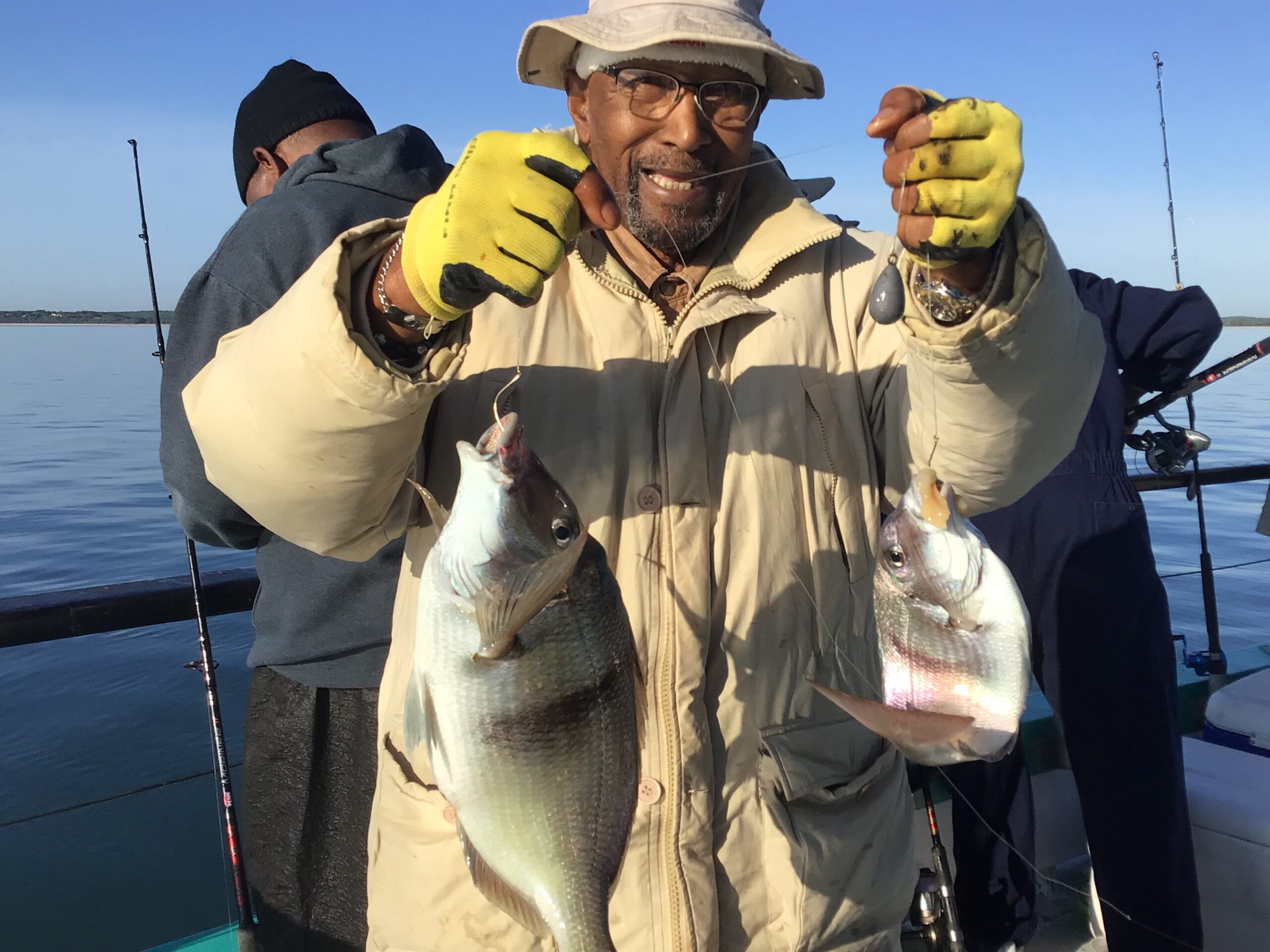 a man holding a fish