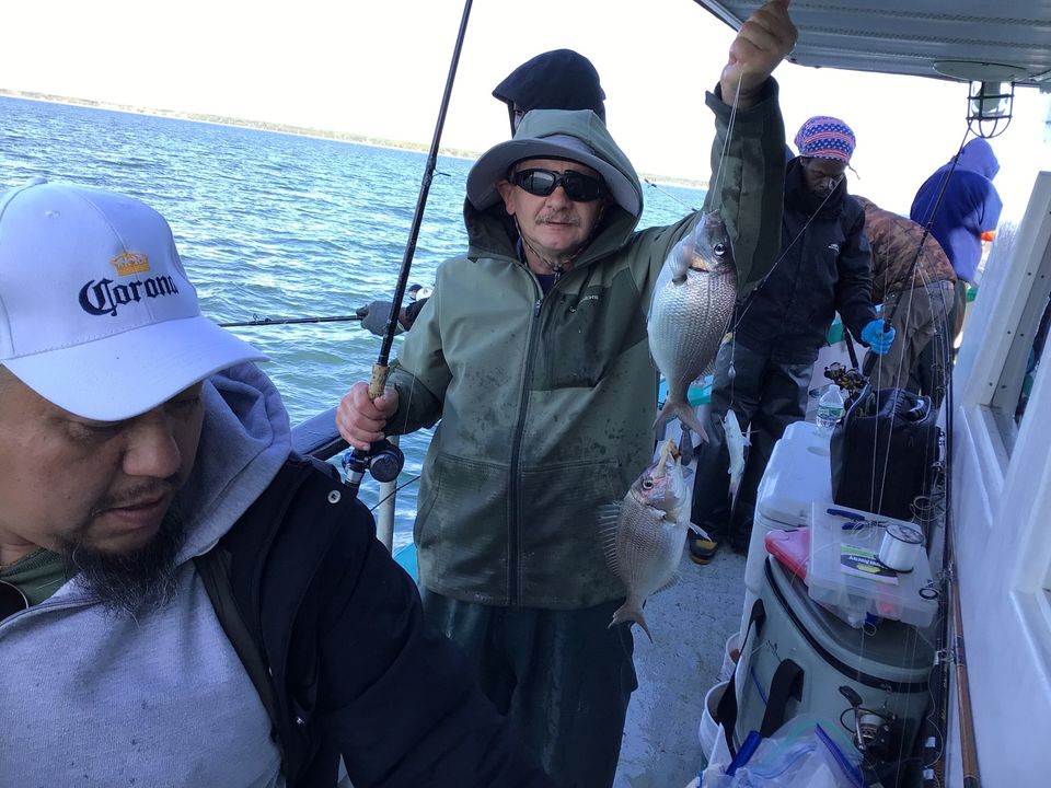 a group of people posing for the camera