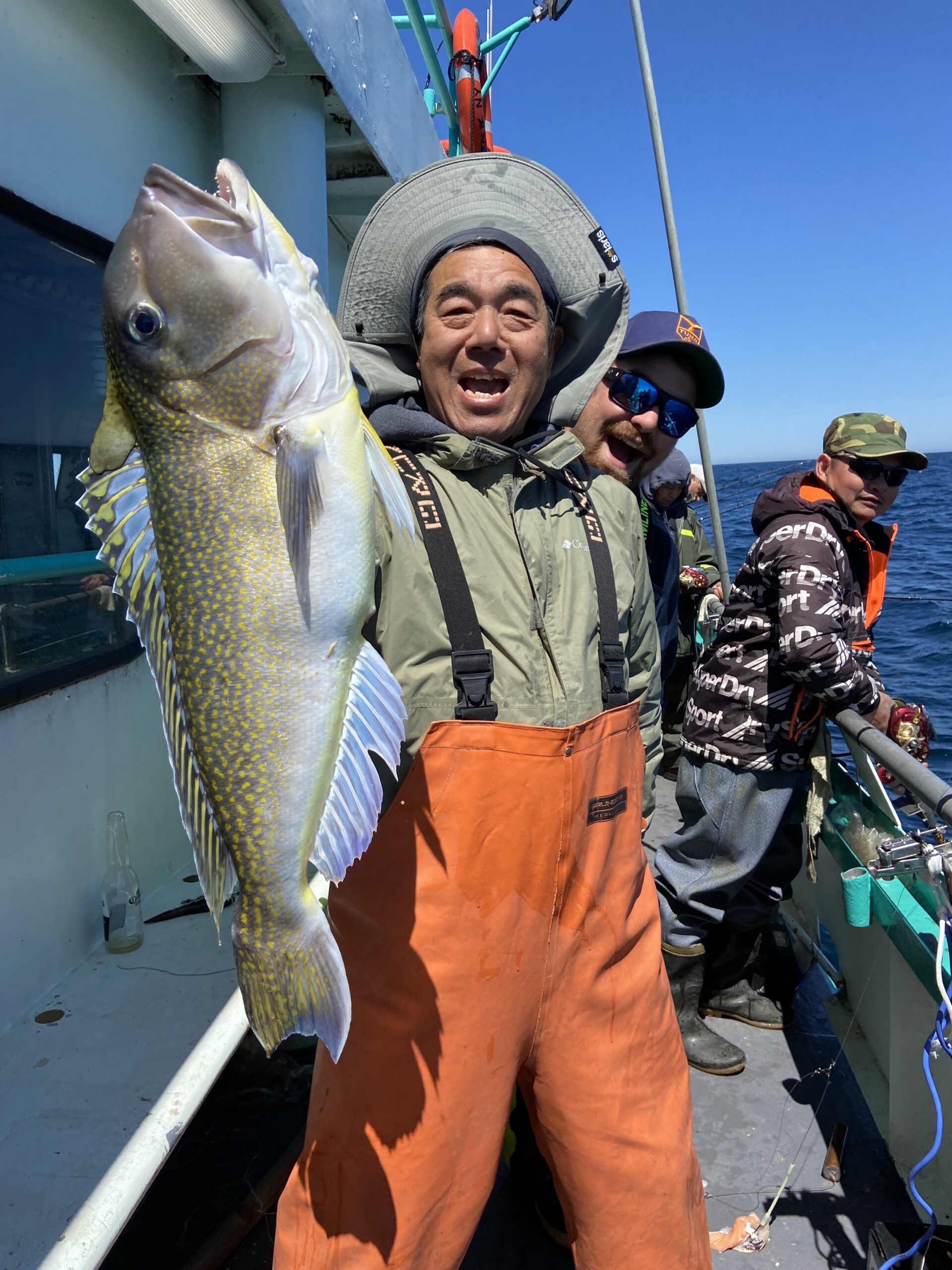 a man holding a fish