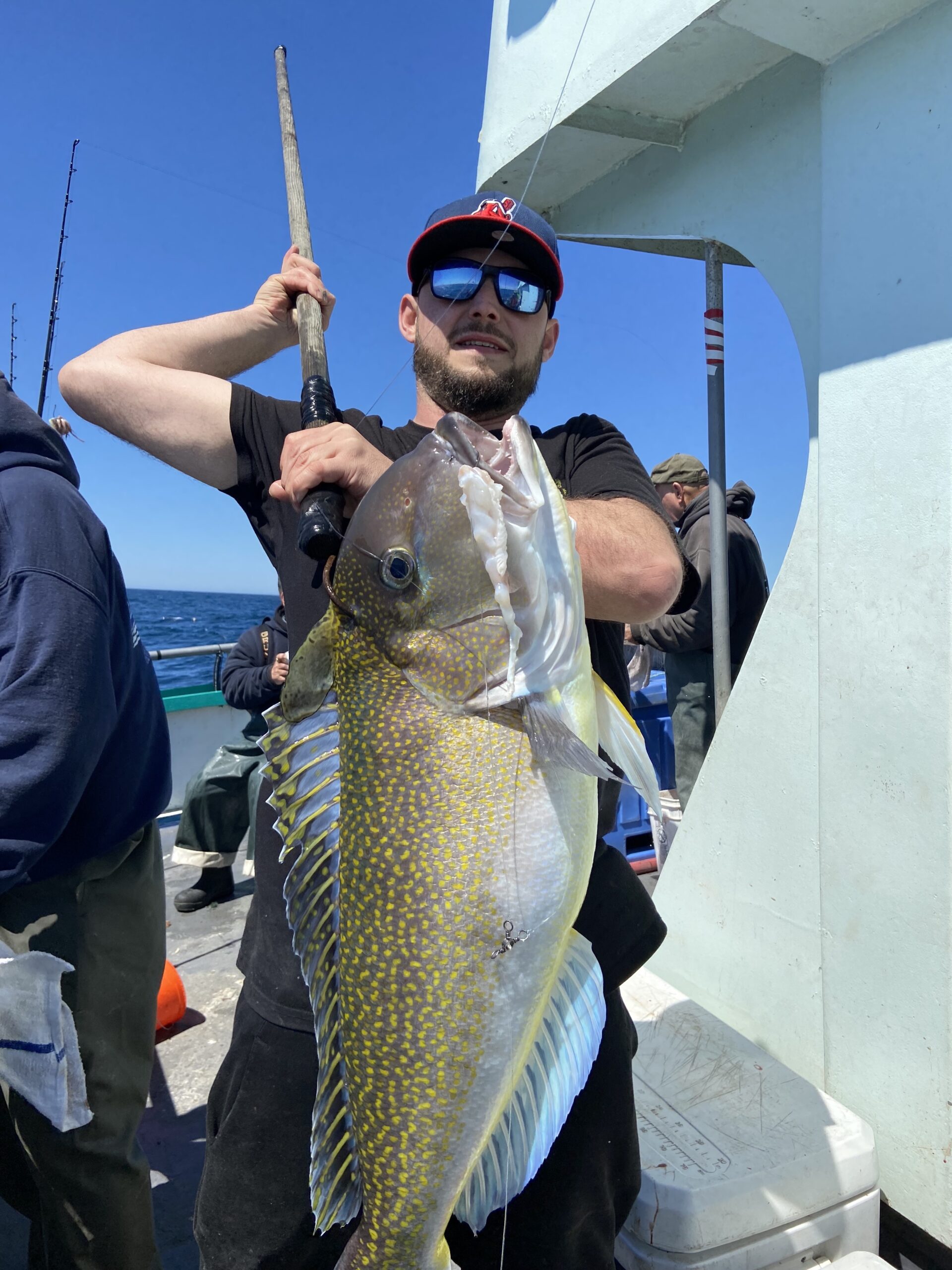 a person holding a fish