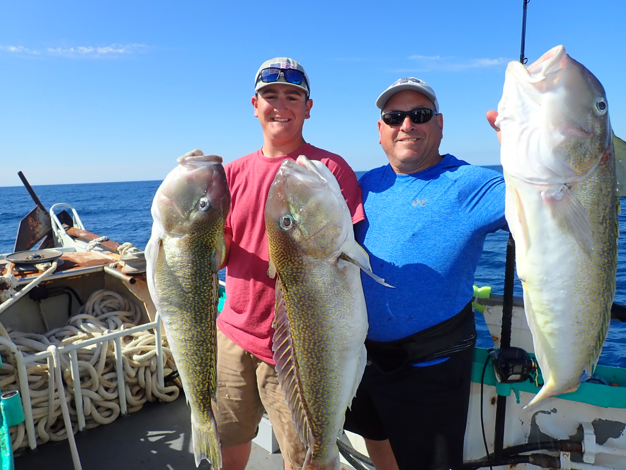 a person holding a fish