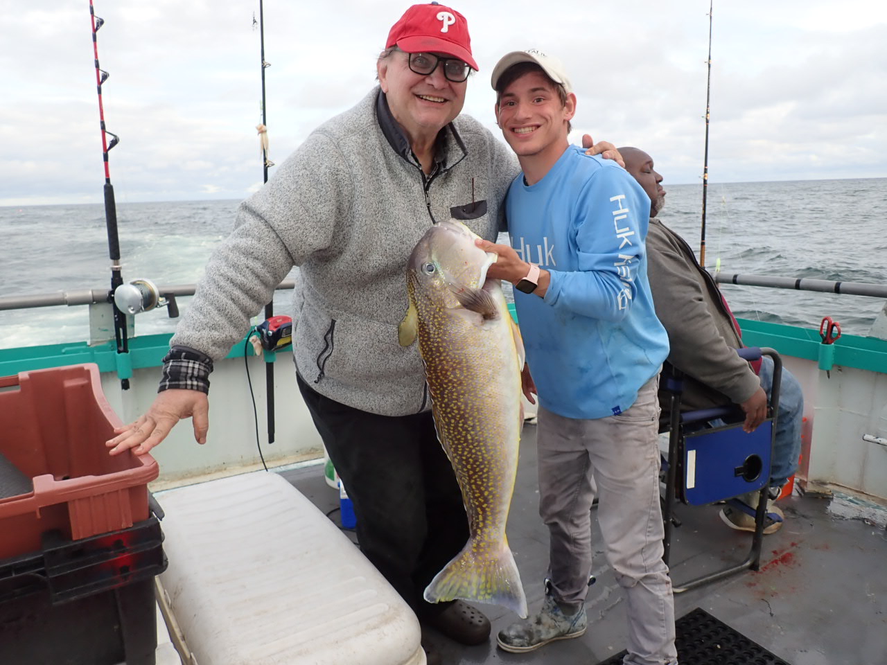 a person holding a fish