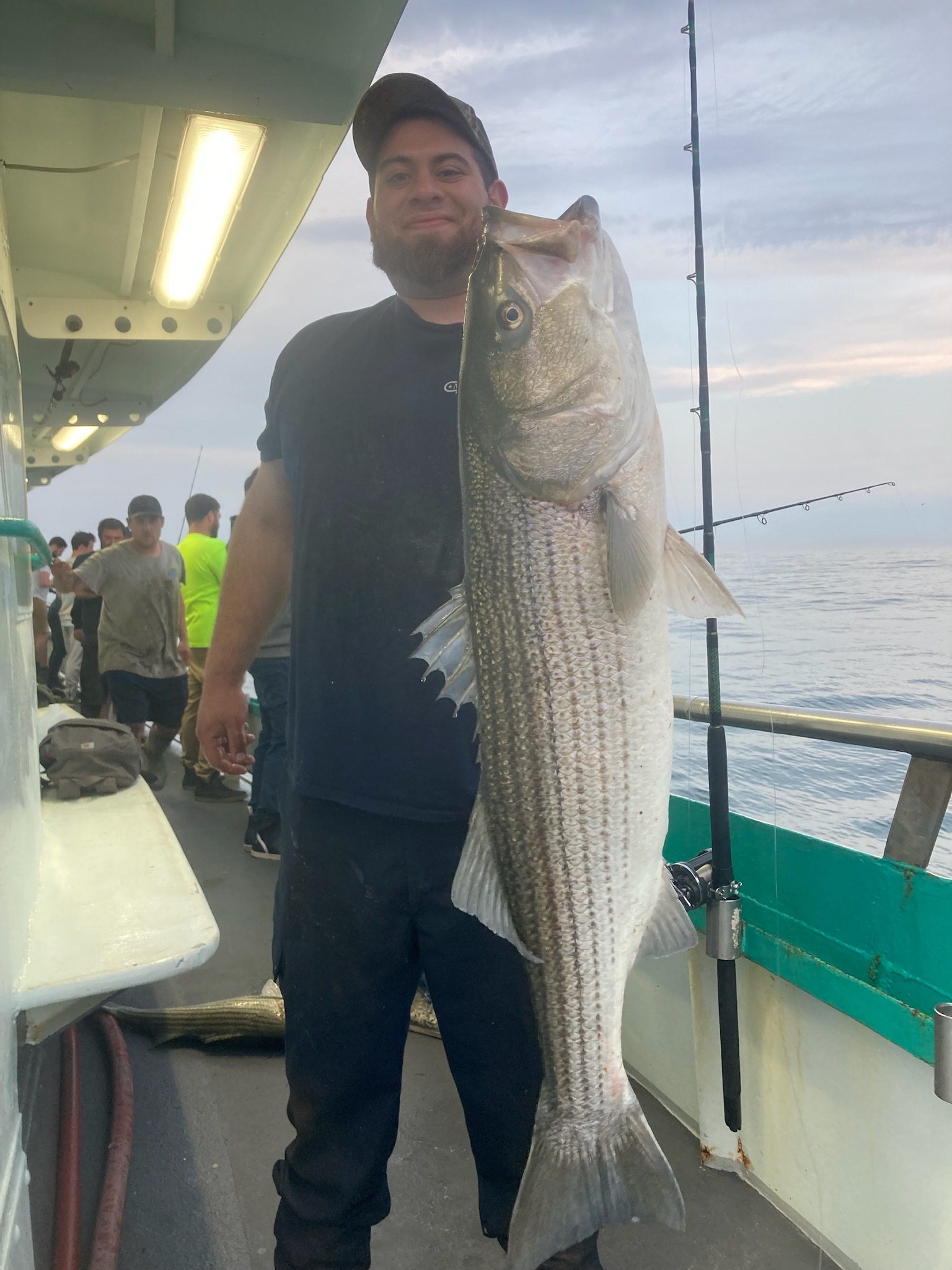 a person holding a fish