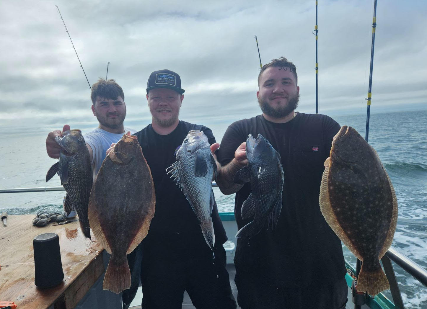 a man holding a fish in the water