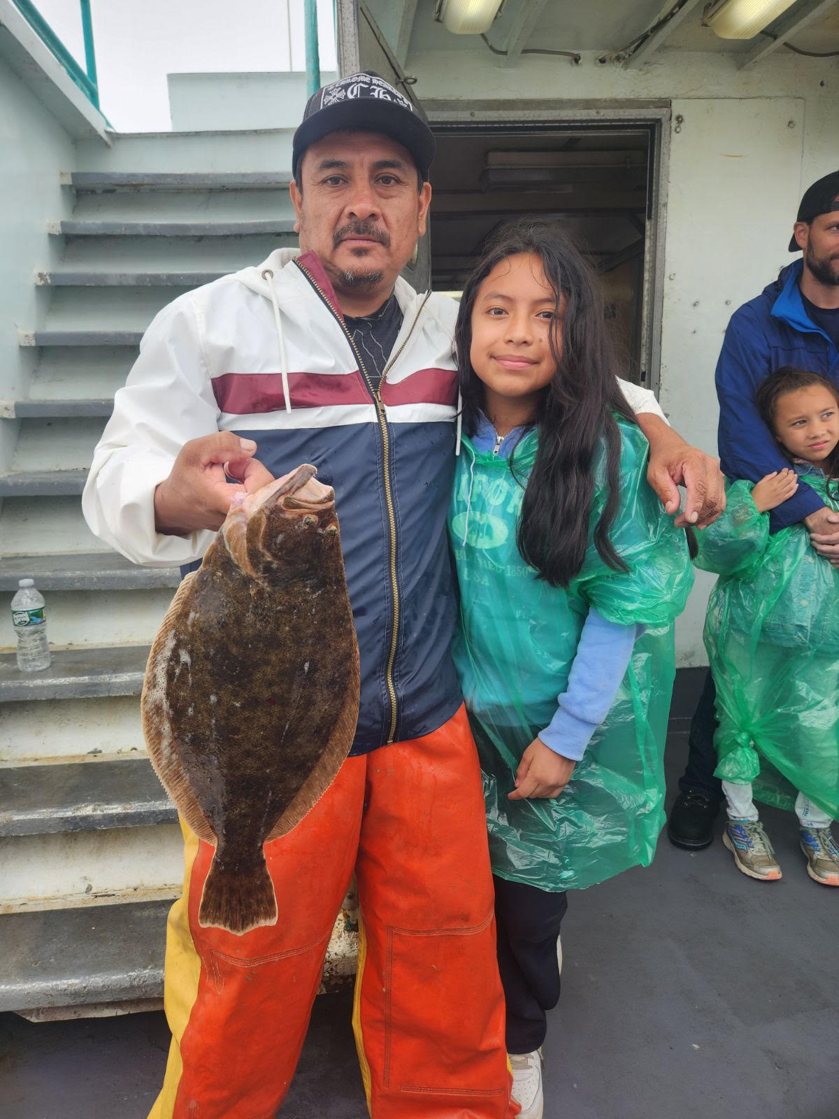 a man holding a fish