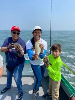 Skyler Gisondo et al. that are standing in the water