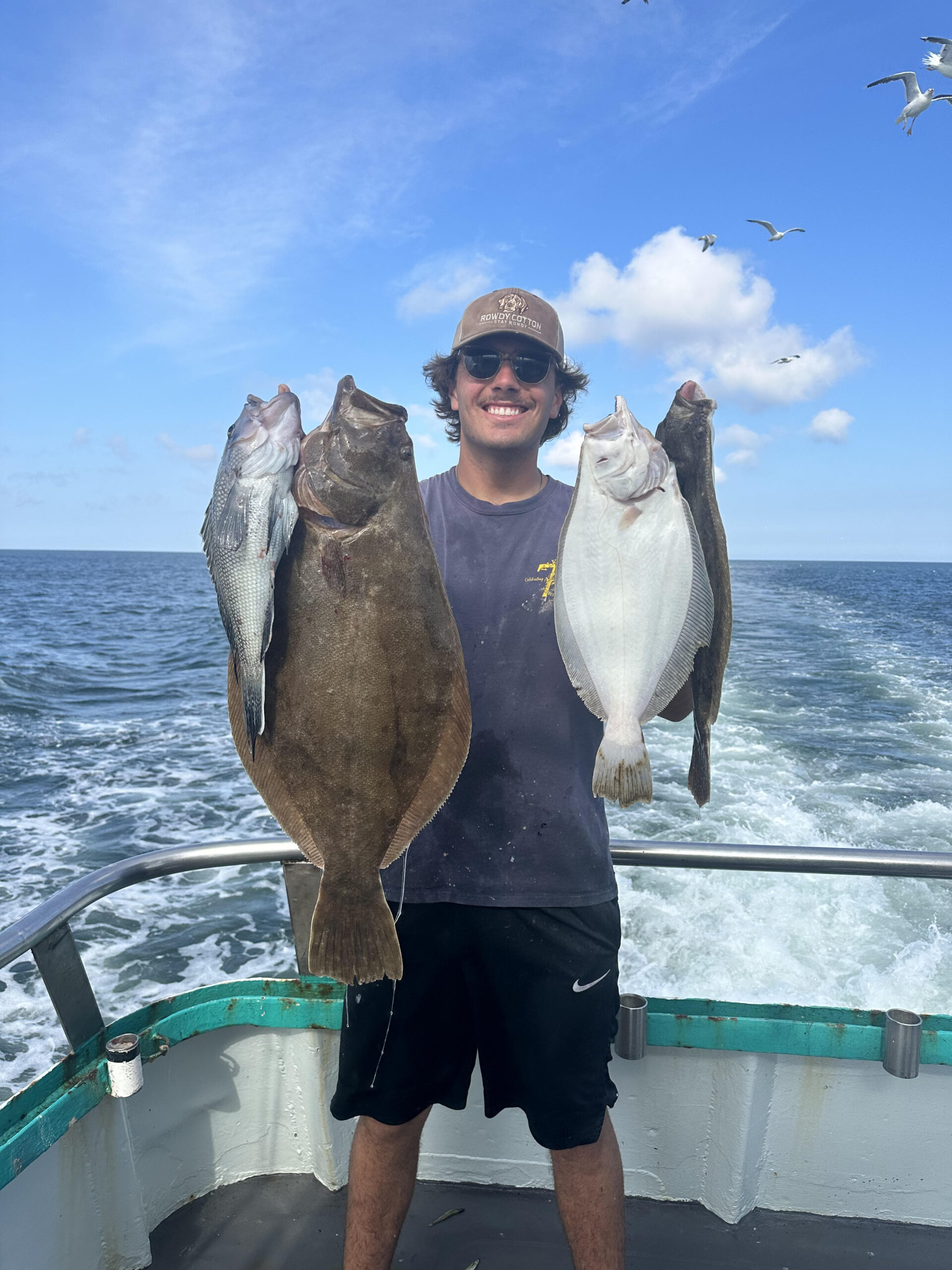 a person holding a fish in the water