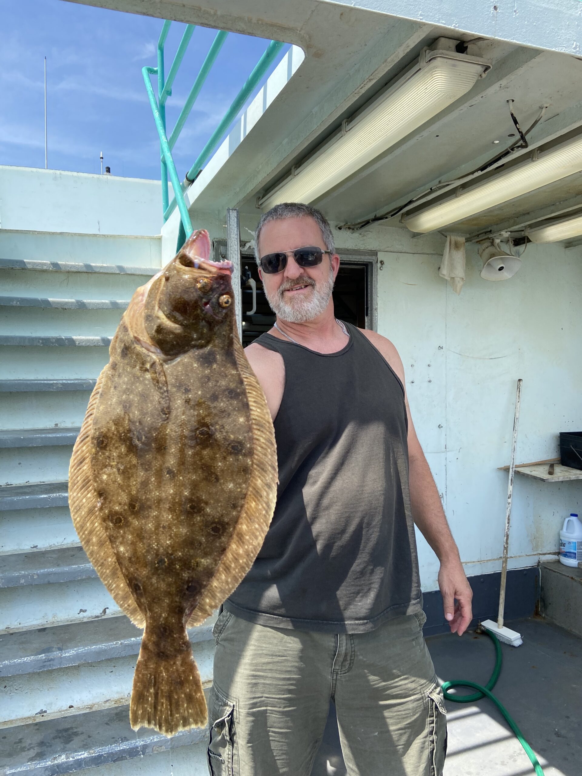 a man standing in front of a building