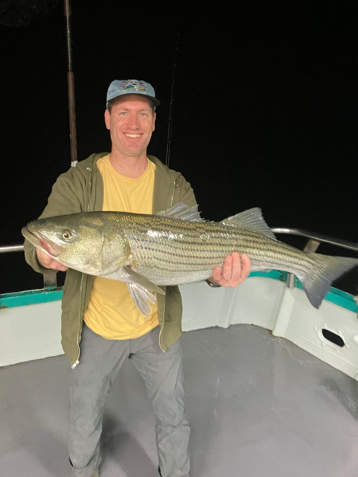 a person holding a fish