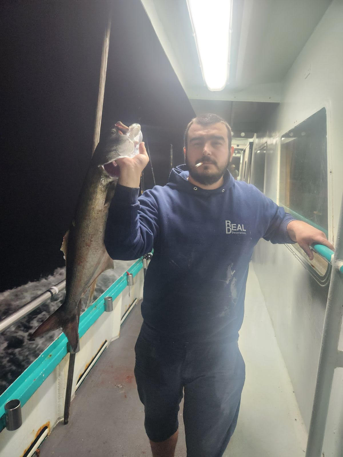 a person standing posing for the camera