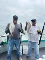 a group of people standing around each other