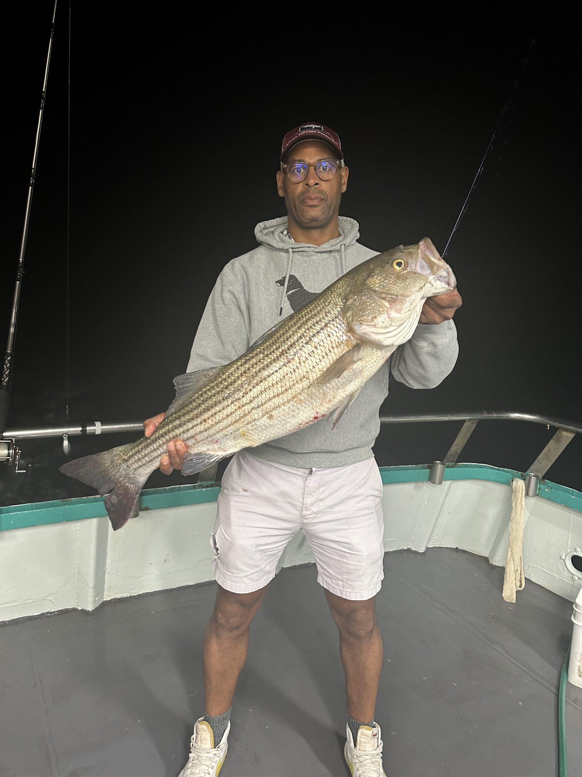 a man holding a fish