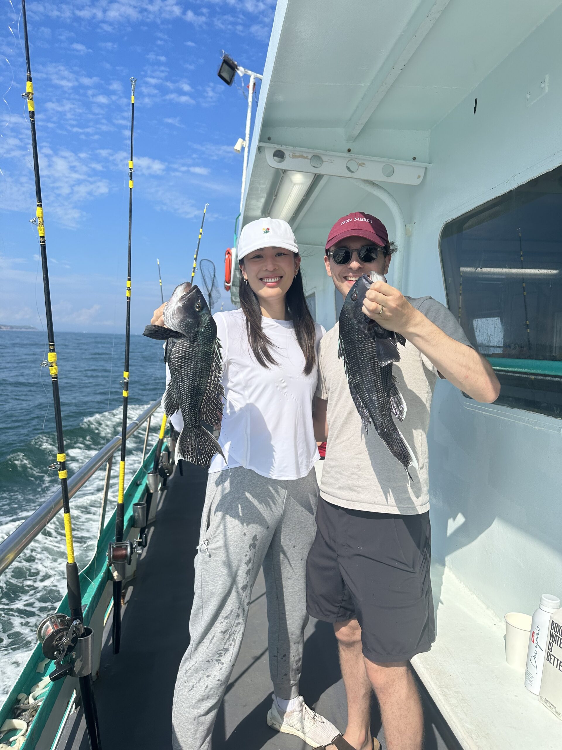 a man and a woman standing on a bridge