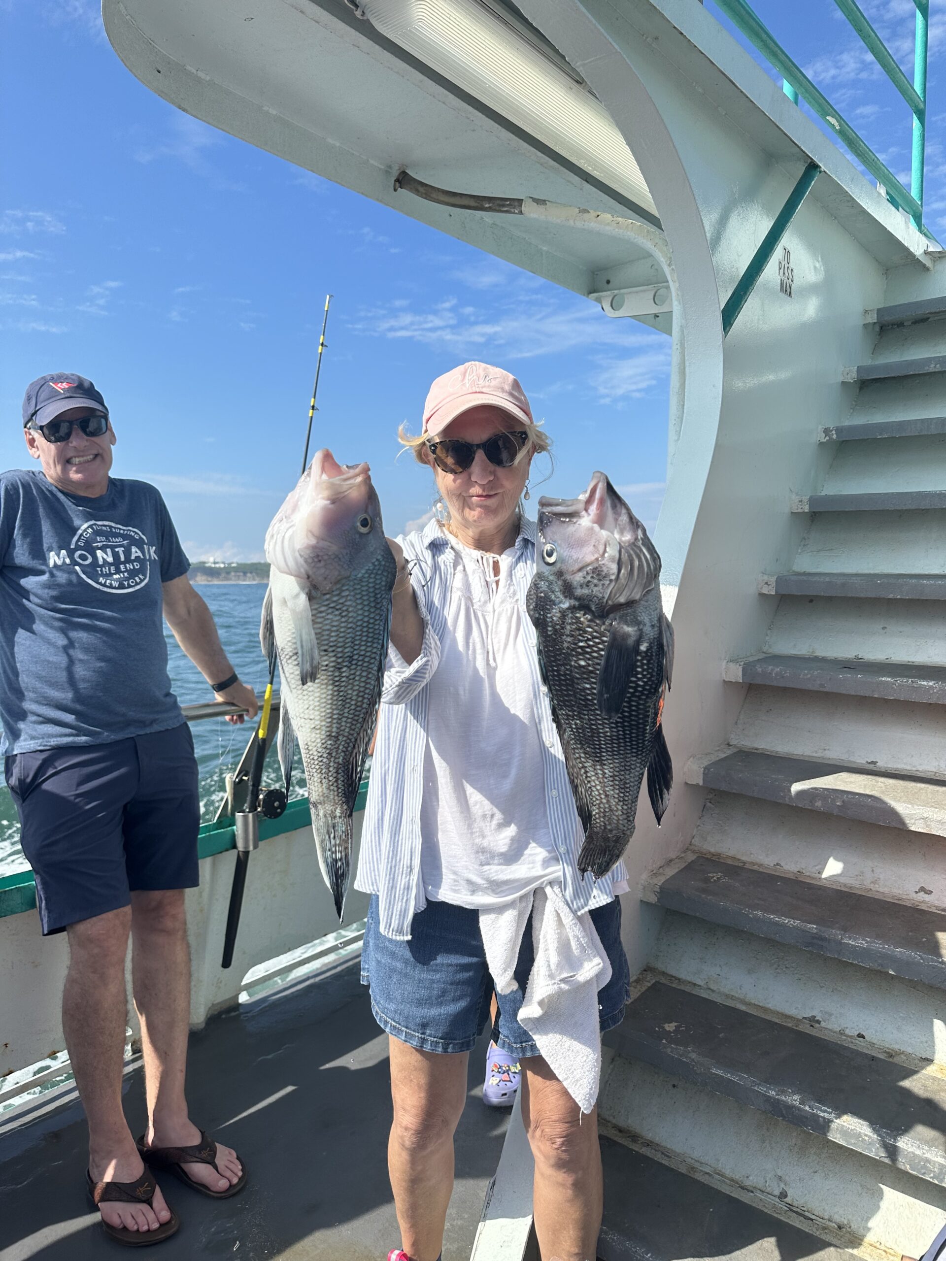 a person holding a fish