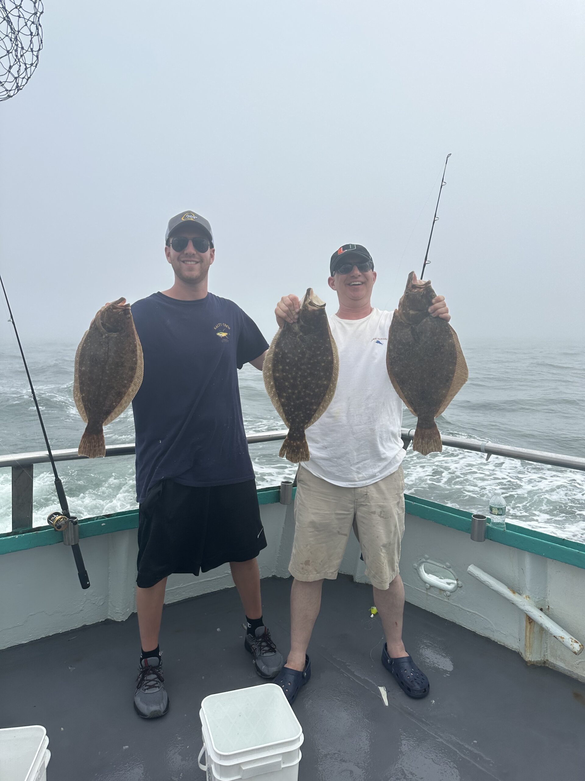 a man standing on a boat in the water