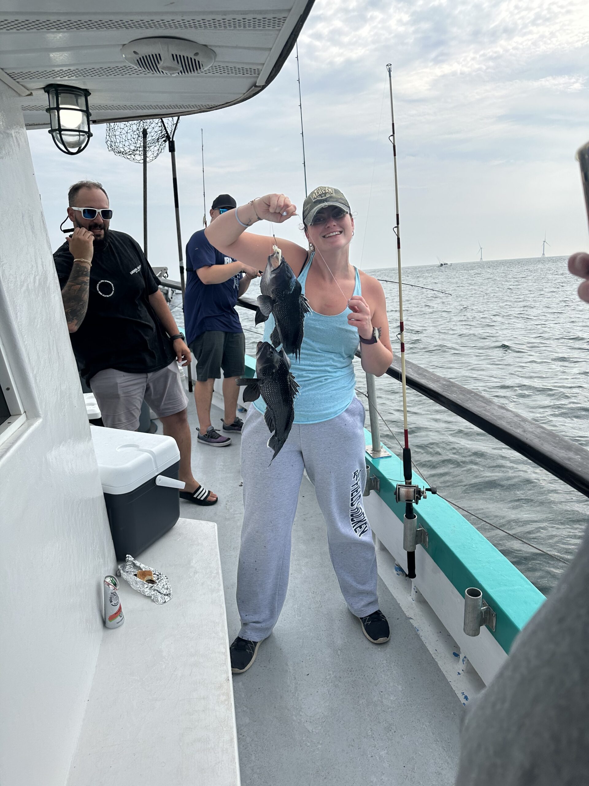 a group of people on a boat in the water