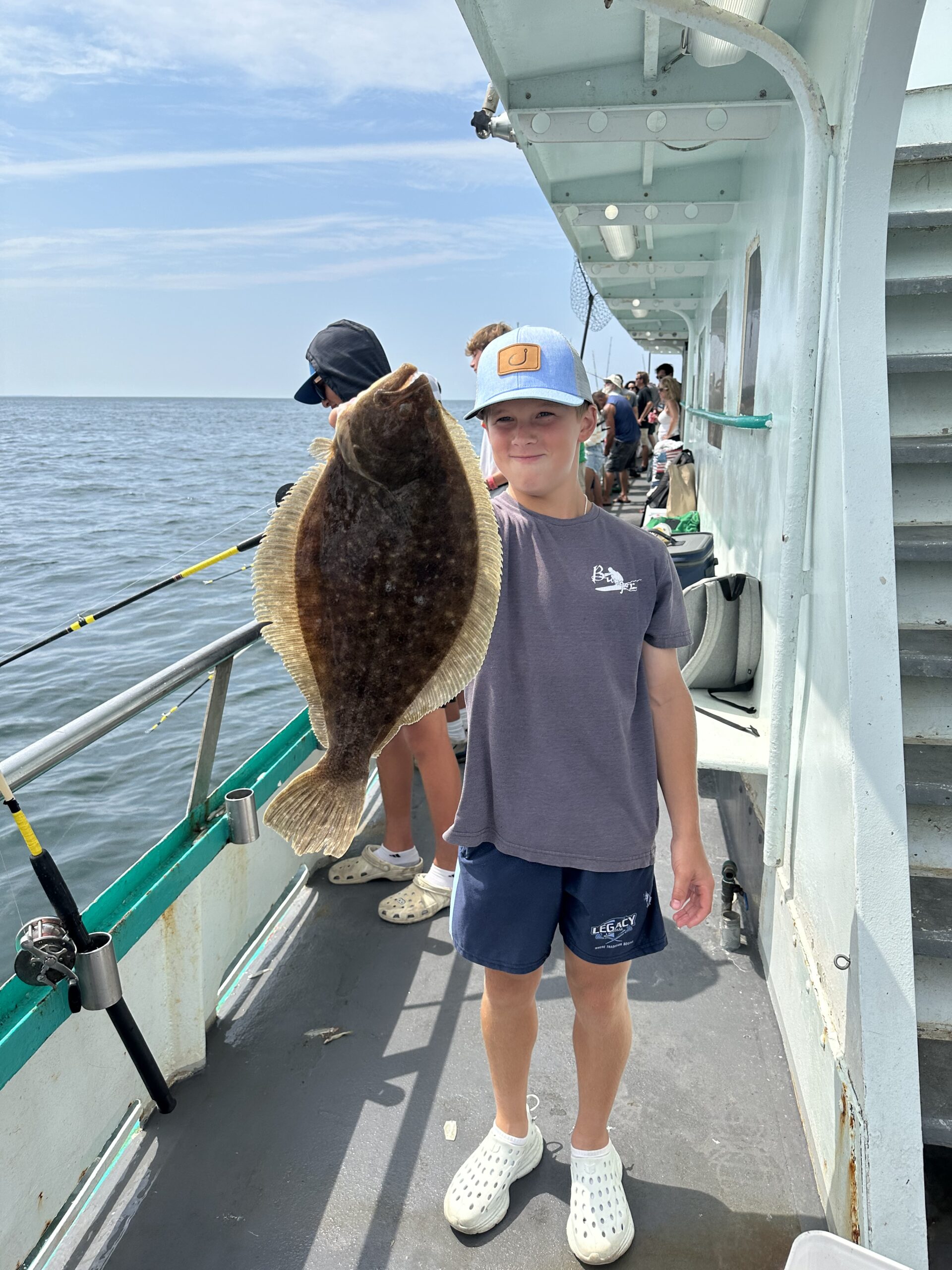 a man standing on a boat in the water