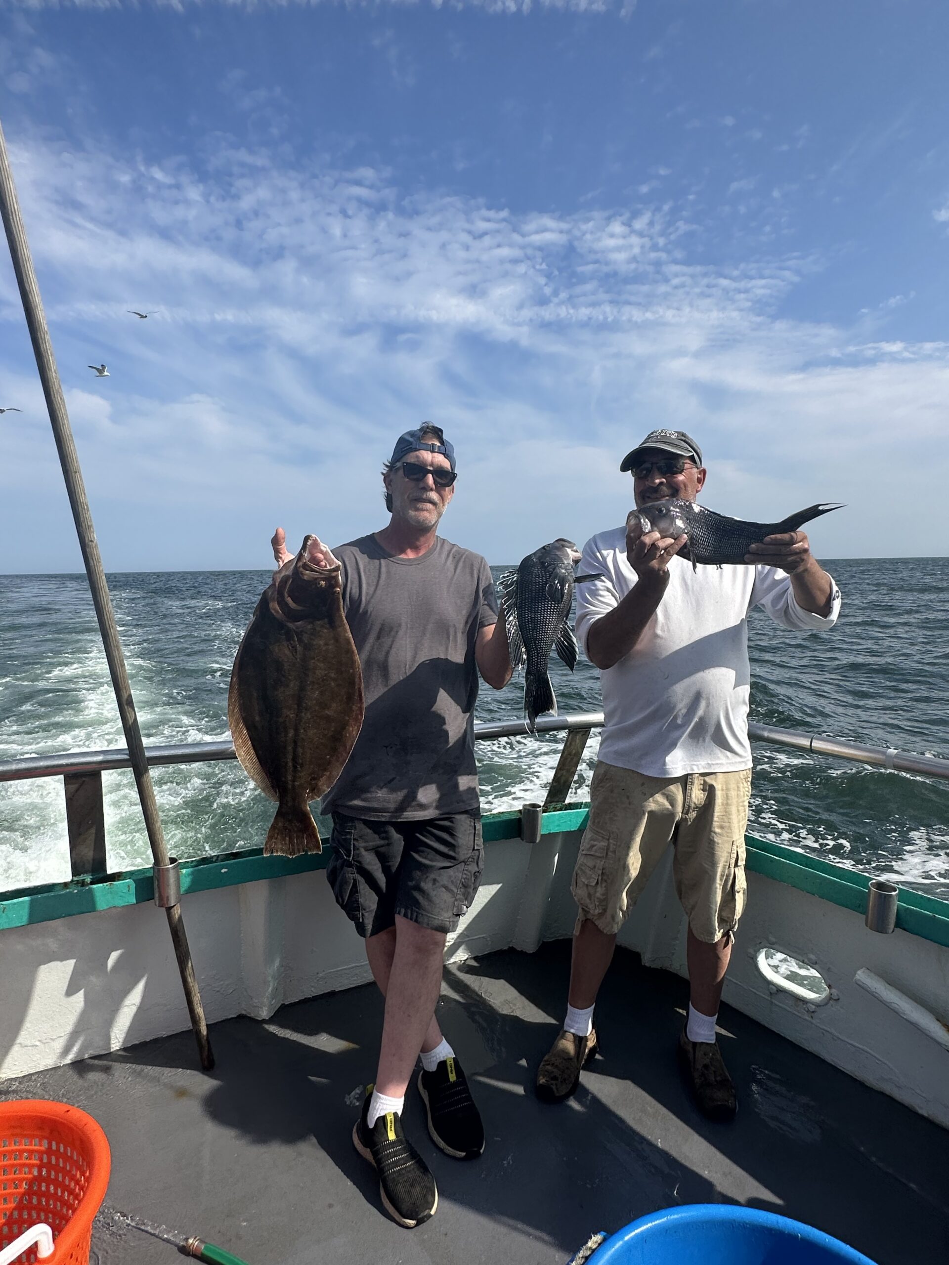 a group of people riding on the back of a boat