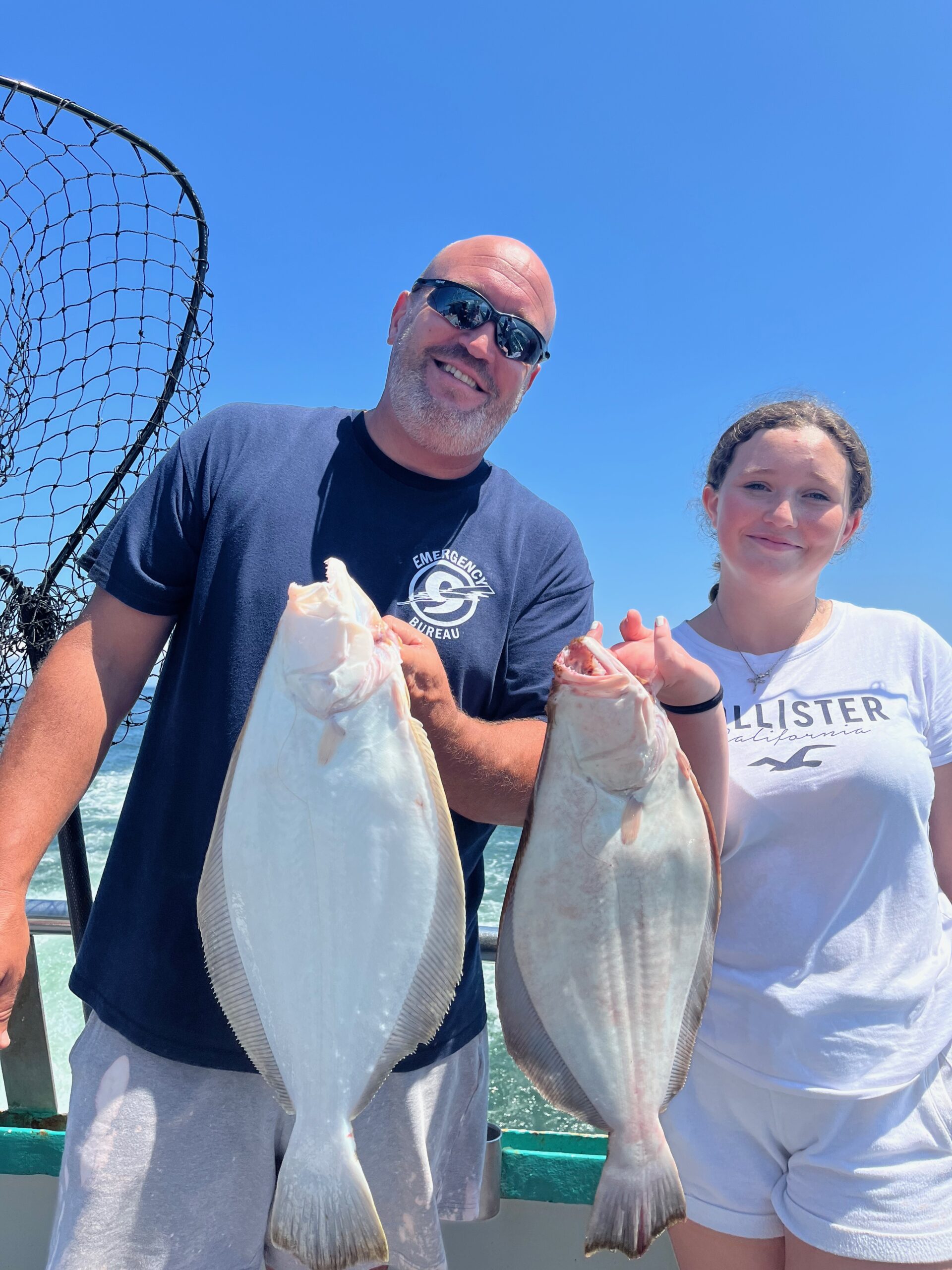 a person holding a fish