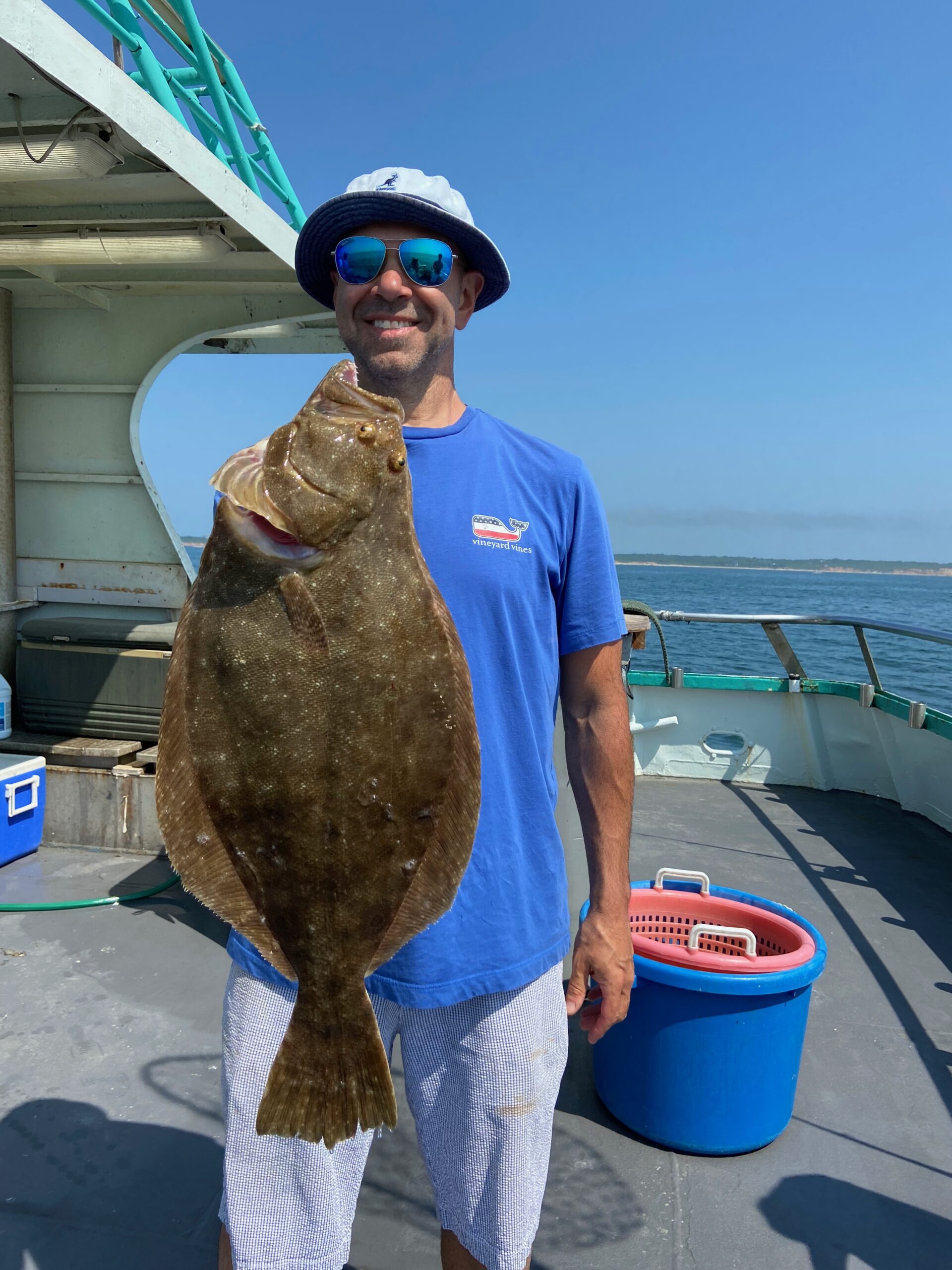 a man holding a fish