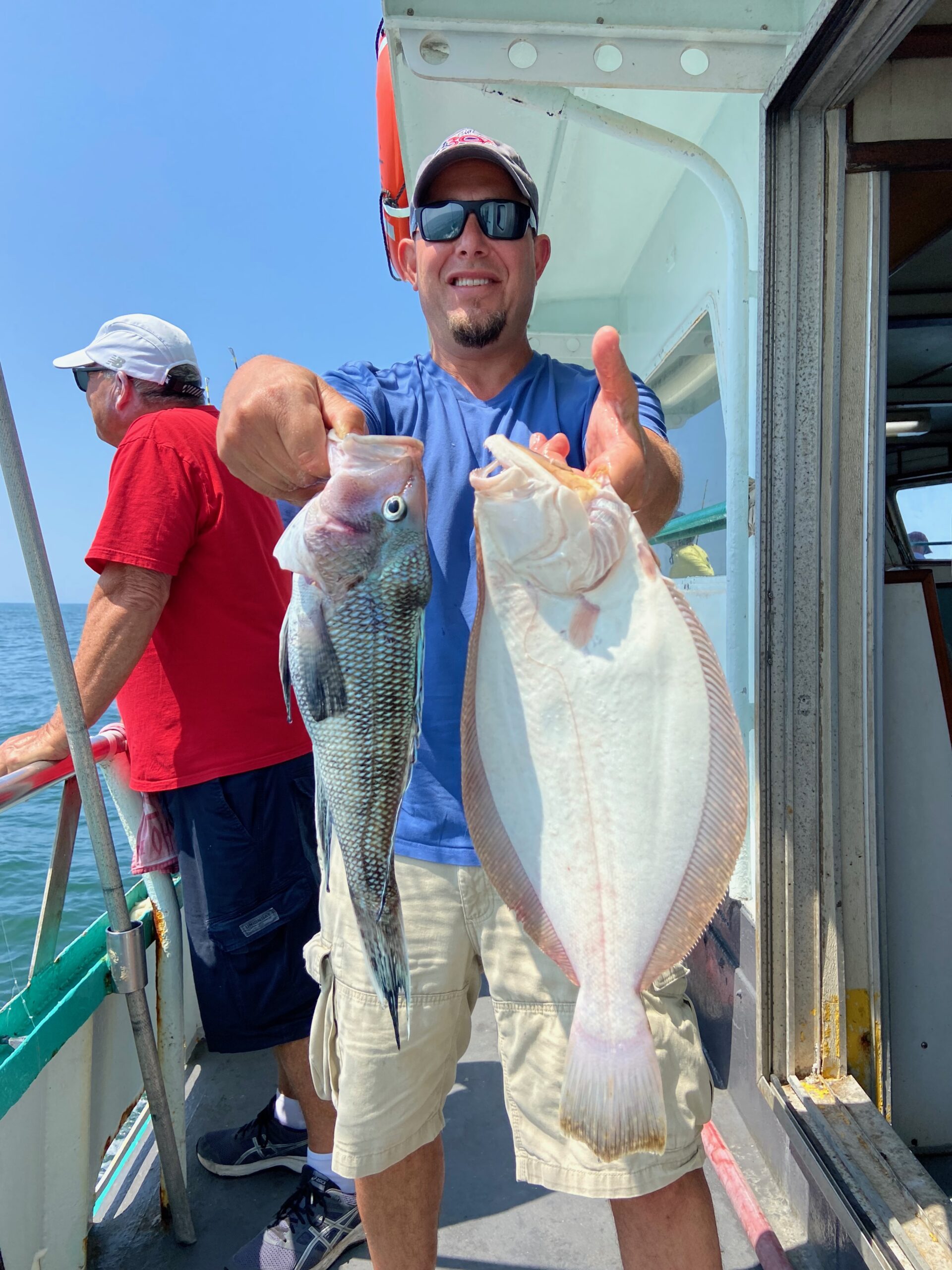 a person holding a fish