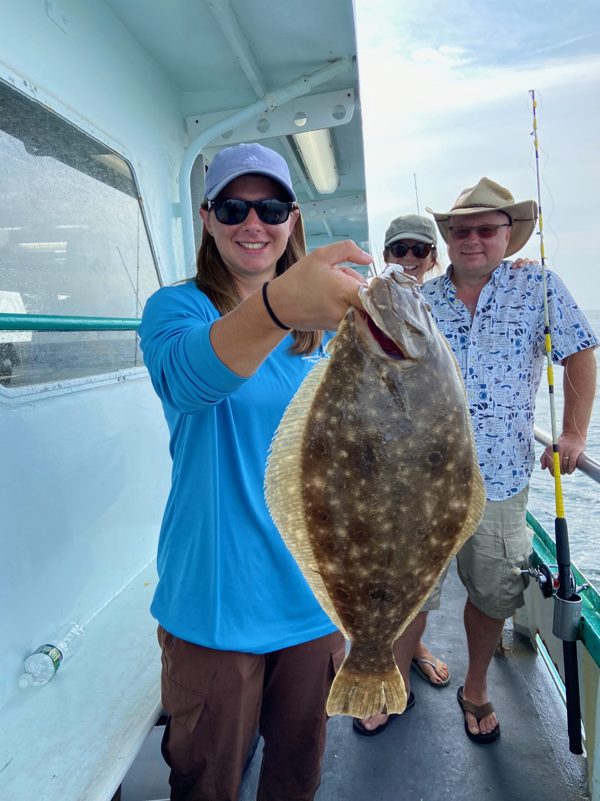 a person holding a fish