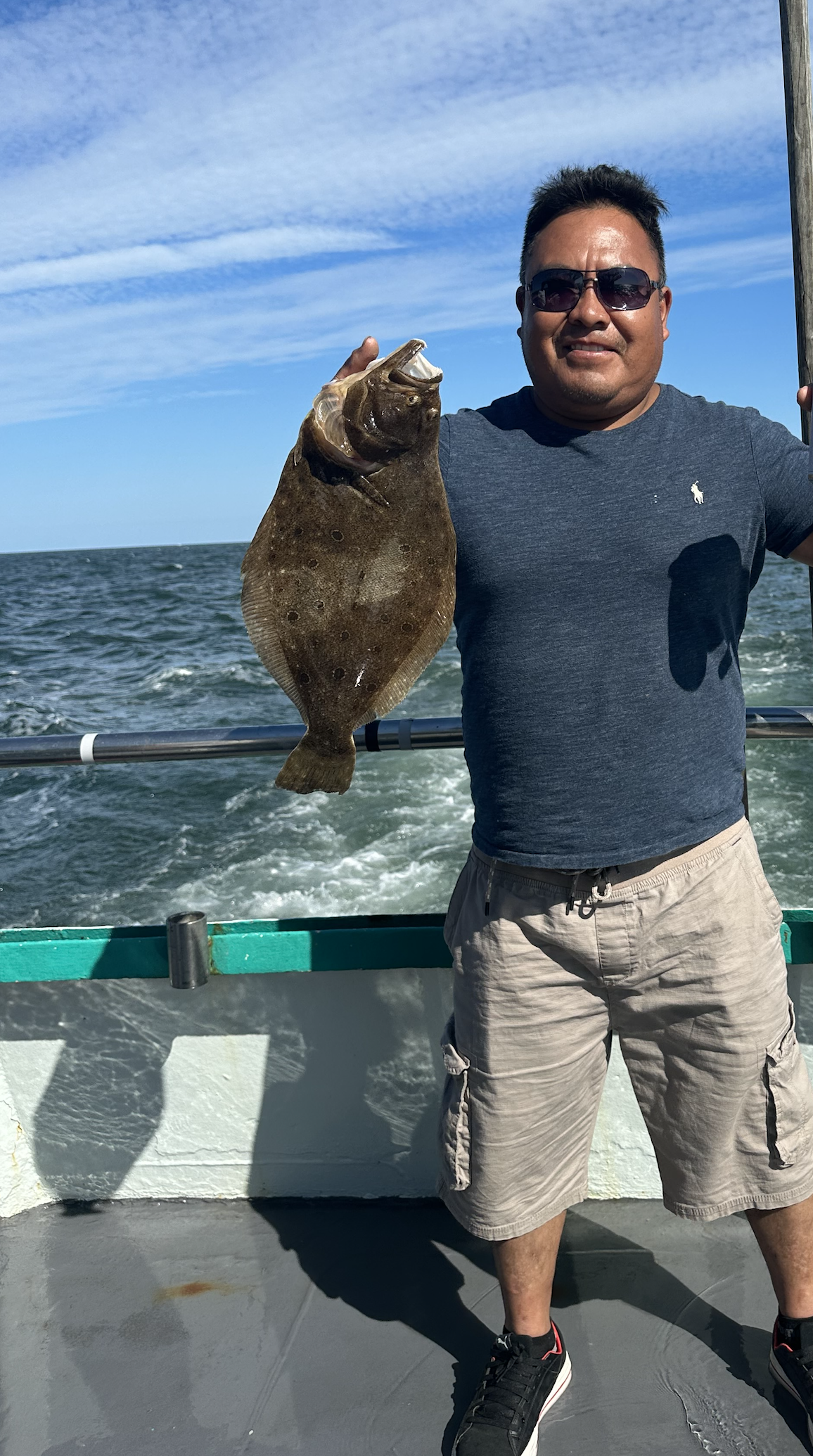 a man that is standing in the water