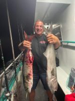 a person holding a fish